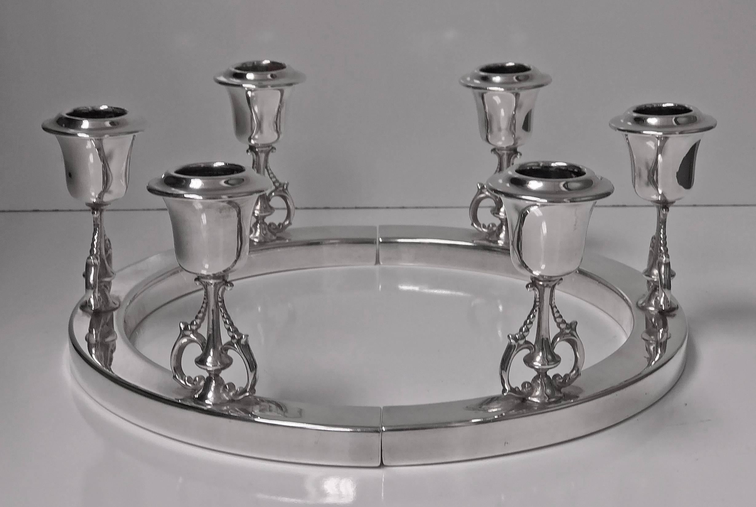 Pair of Art Deco American sterling candelabra candlesticks, New York, circa 1925, A.L. Wagner & Son. The candelabra of modernistic ‘Scandinavian’ design, each of a hemi spherical shape, together forming a fully rounded artistic design, on two hemi