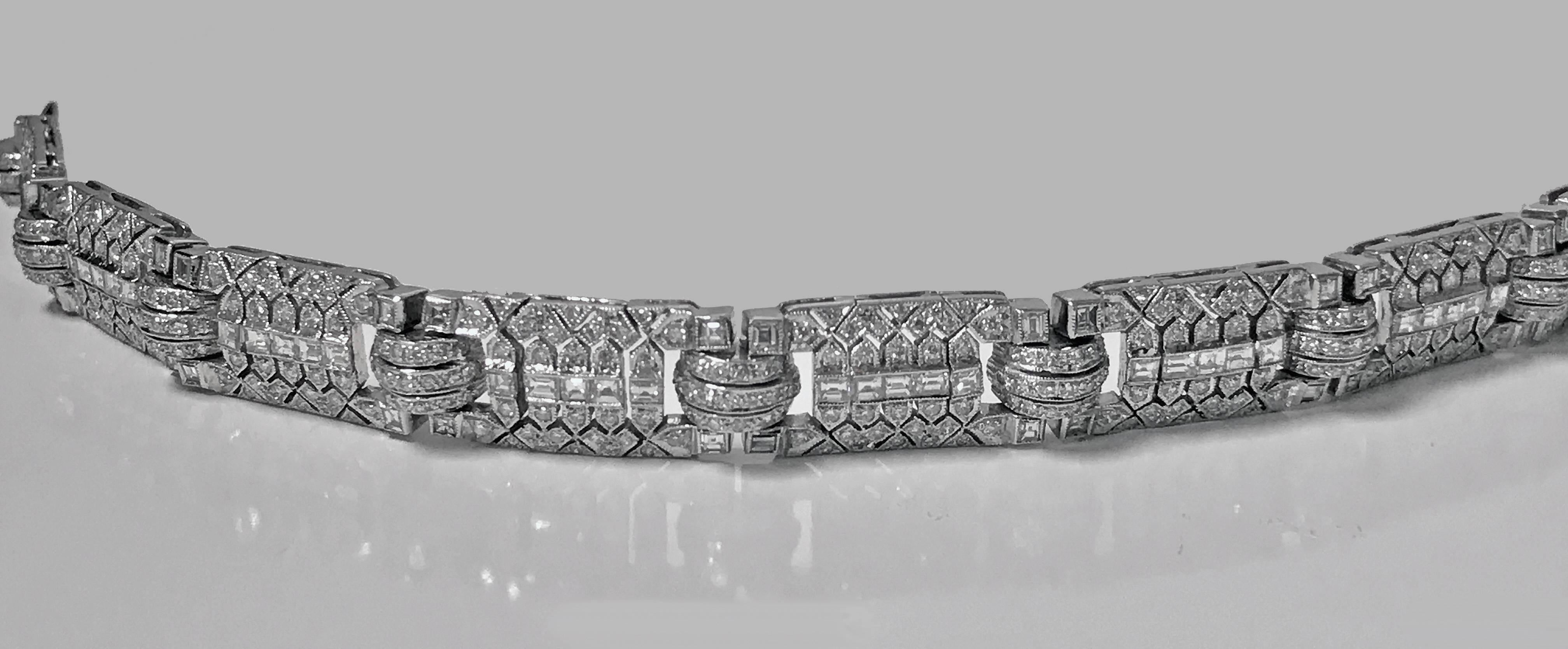 Ladies 18-karat Art Deco diamond bracelet, circa 1930. The flexible link bracelet of geometric design, set with nine plaque sections, each set with 51 round brilliant cut diamonds and nine square cut diamonds, total approximate weight of 3.55 cts,