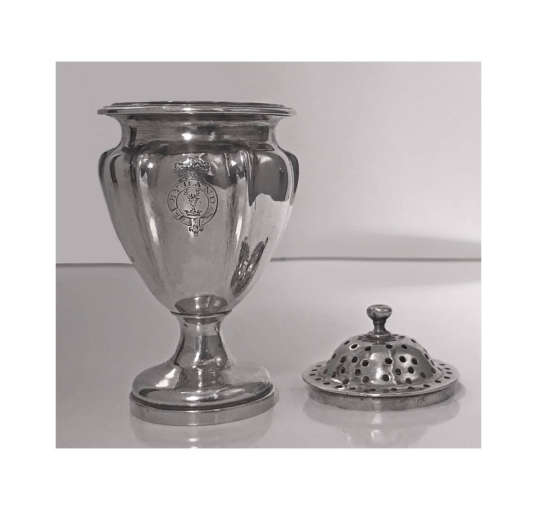 Antique silver pounce pot, London circa 1830, Benjamin Stephens. The pot of tapered vase form, round pedestal base, removable pierced cover. Marked on body and cover and engraved crest of a stags head erased and motto Bydand... Remain for Gordon.