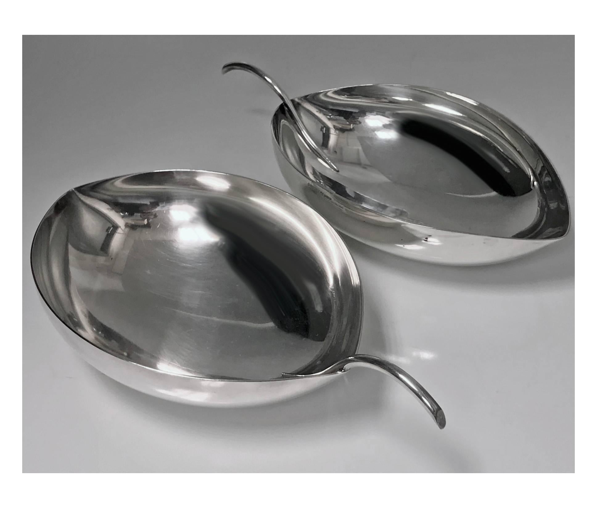 Pair of Christofle silvered metal bowls designed by Tapio Wirkkala (1915-1985) for Christofle, Gallia. Iconic plain leaf form. Measures: 9 x 5 x 2 inches. Christofle marks.