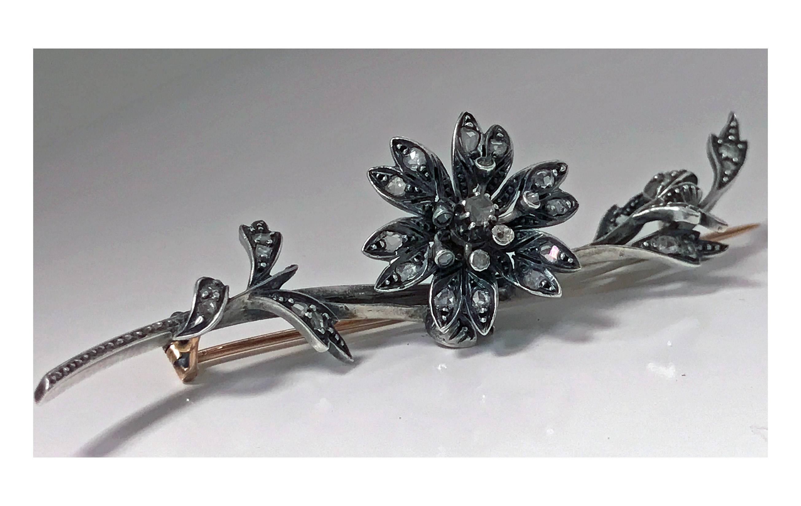 Antique Victorian Rose Cut Diamond Tremblant Brooch, mounted in silver on gold Tremblant of usual form,set with approximately 32 rose cut diamonds in cut down silver on gold, English C. 1875. Length: 3 inches. Item Weight: 9.47 grams.