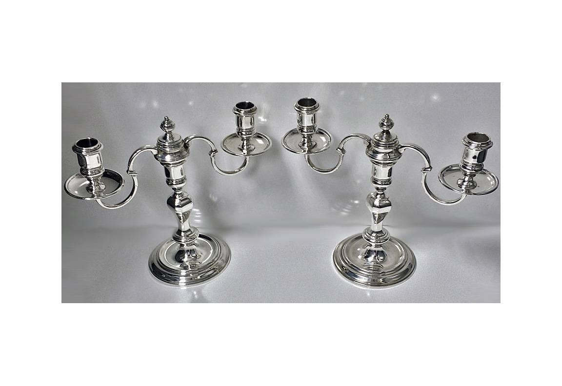 Pair of English Silver Queen Anne style Candelabra Candlesticks, London 1956, retailers mark for Harrods. Each in the Queen Anne style with round bases and knopped baluster stems, supporting two or three light (convertible) branches. Height: 8