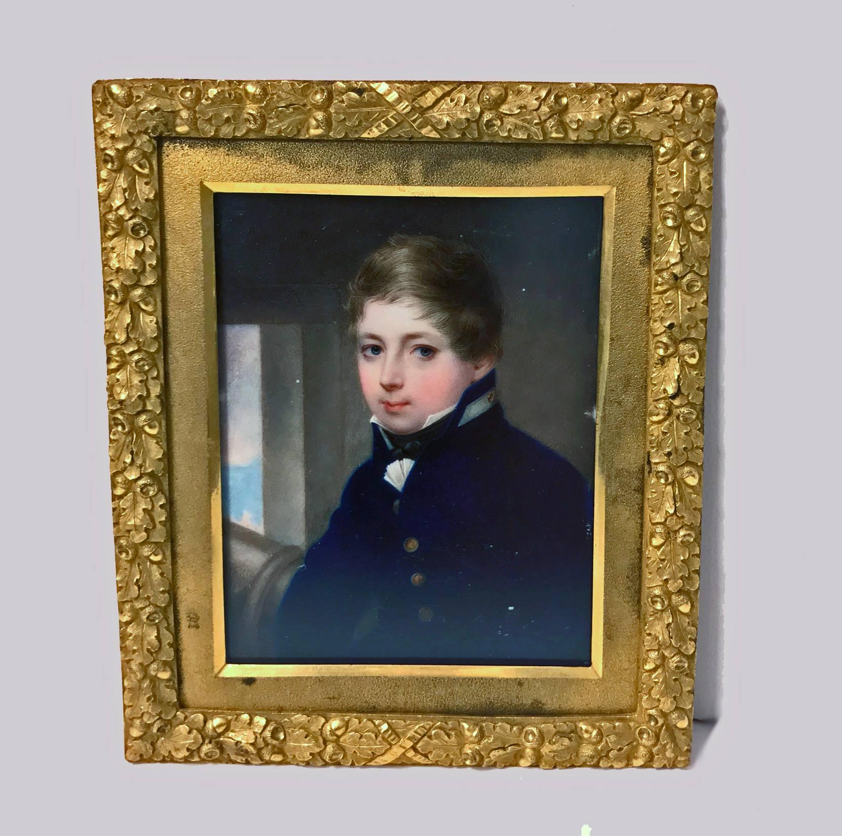 Portrait Miniature, John Cox Dillman Engleheart (1783 - 1862), circa 1815. Augustus Morgan R.N., as a young Midshipman, wearing blue uniform, the gold buttons stamped with anchors, frilled white chemise and tied black stock, a cannon and gun port in