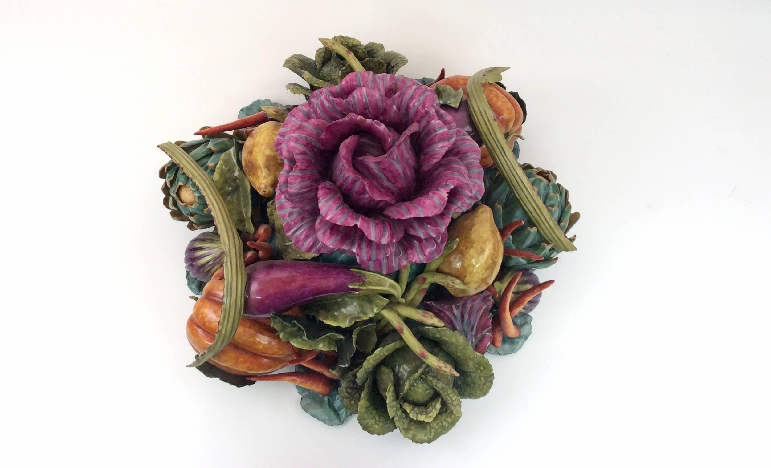 This centerpiece is composed of vegetables seen in Jan De Heem 17th century paintings. This is a one of kind handcrafted piece.
Katherine Houston is a living artist working in an 18th century technique, adapting the techniques and masterful