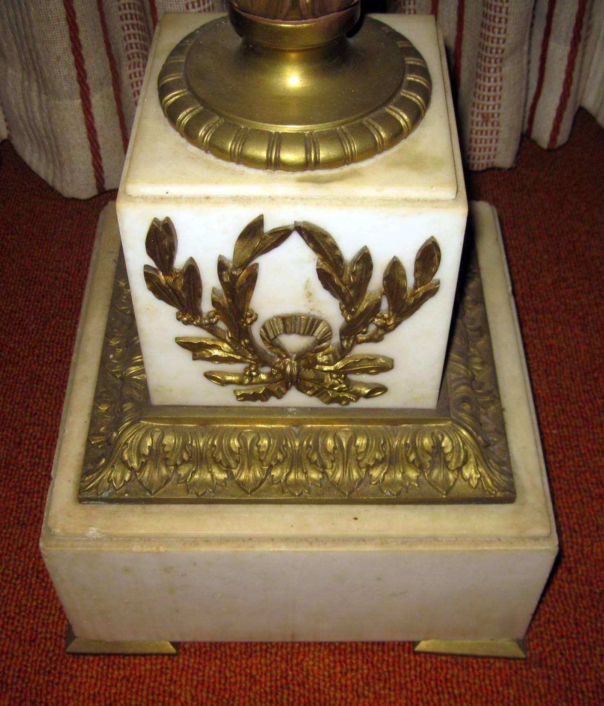 Louis XVI style French solid marble pedestal featuring gilt decoration and ormolu mounts in an acanthus leaf and laurel wreath motif.
See measurements below.