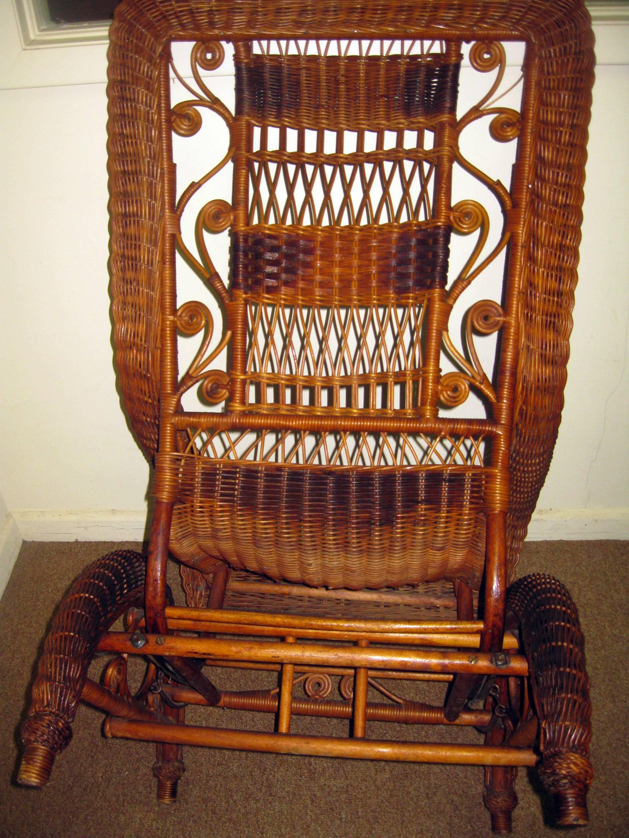 Unlabelled but this somewhat bulky design is often associated with Heywood Bros. & Wakefield Company shortly after their merger in 1897. Unique staining with shadow effect was also a hallmark of this newly formed firm. Pieces attributed to this