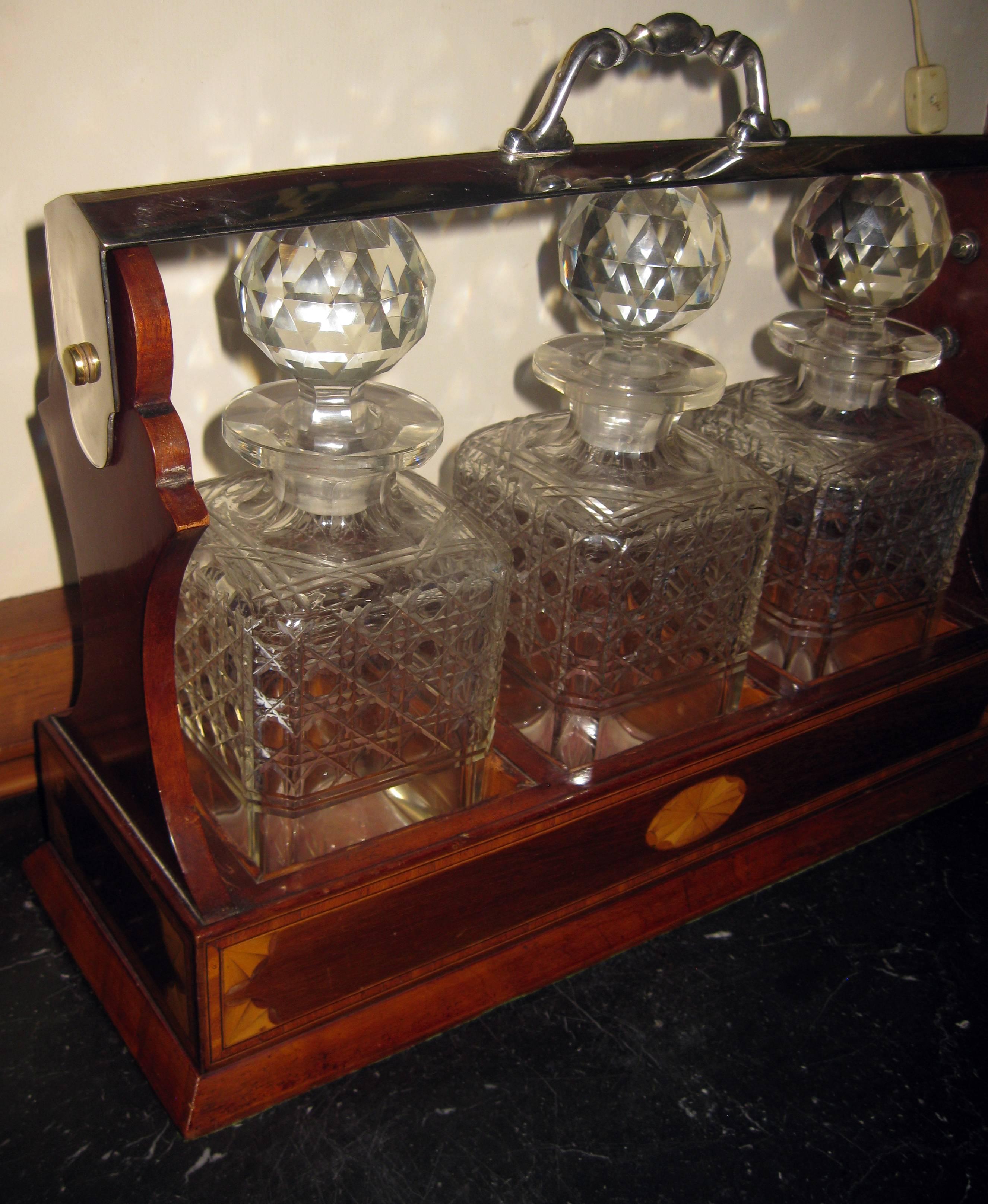 Cut Glass 19th Century Georgian Inlaid Mahogany Tantalus with Three Decanters