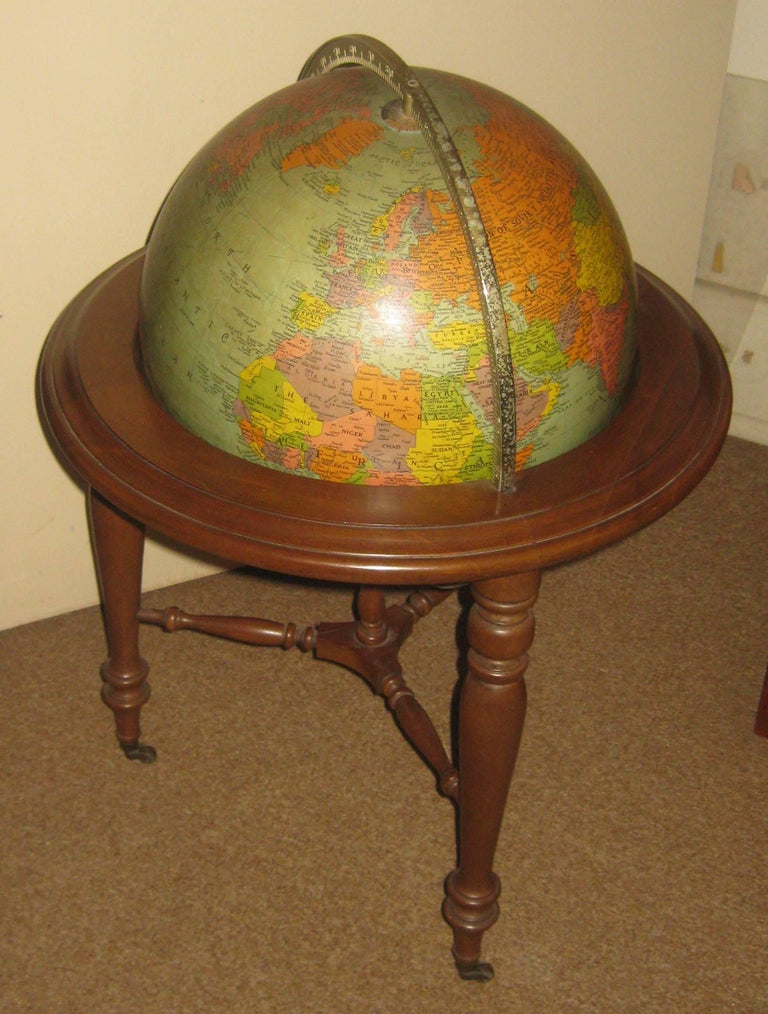 20th Century World Globe on Wooden Tripod Pedestal at 1stDibs