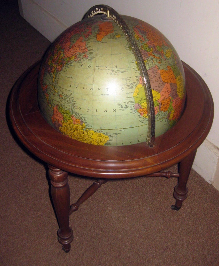 20th Century World Globe on Wooden Tripod Pedestal at 1stDibs