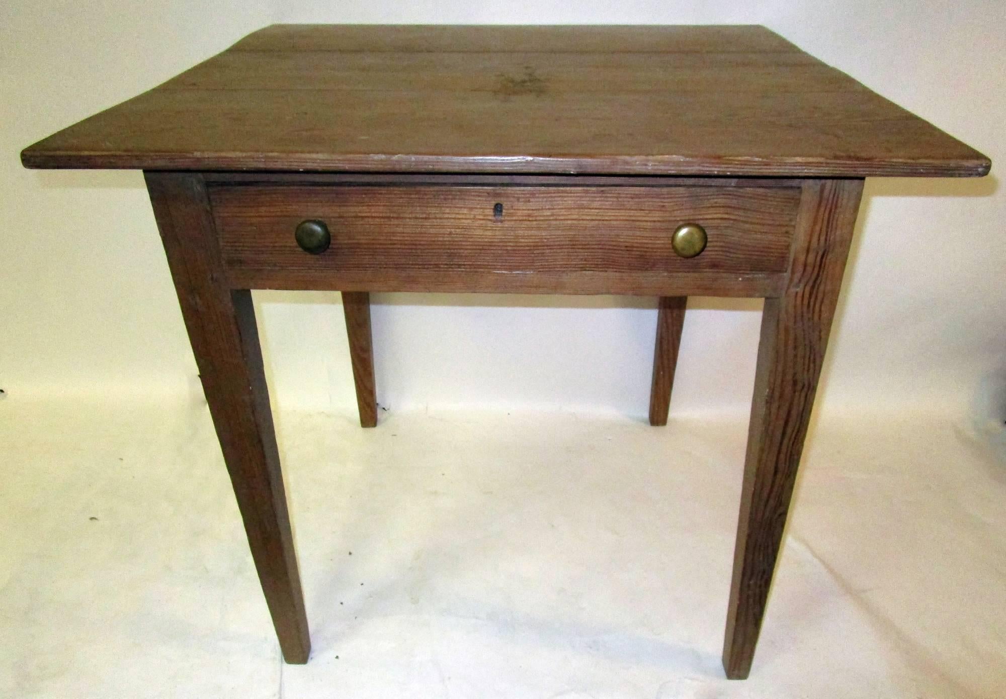 From Mississippi river plantation in Louisiana, this kitchen work table features one drawer with painted interior surface, square tapered legs and old brass pulls. See measurements below.