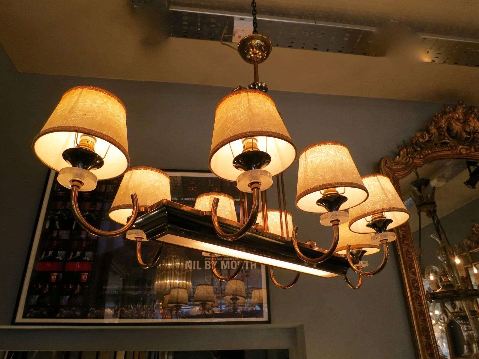 Mid-20th Century Pair of French Brass, Gunmetal and Lucite Chandeliers Attributed to Jansen