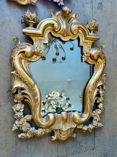A Pair Of Antique Italian Gold Giltwood Carved Mirrors