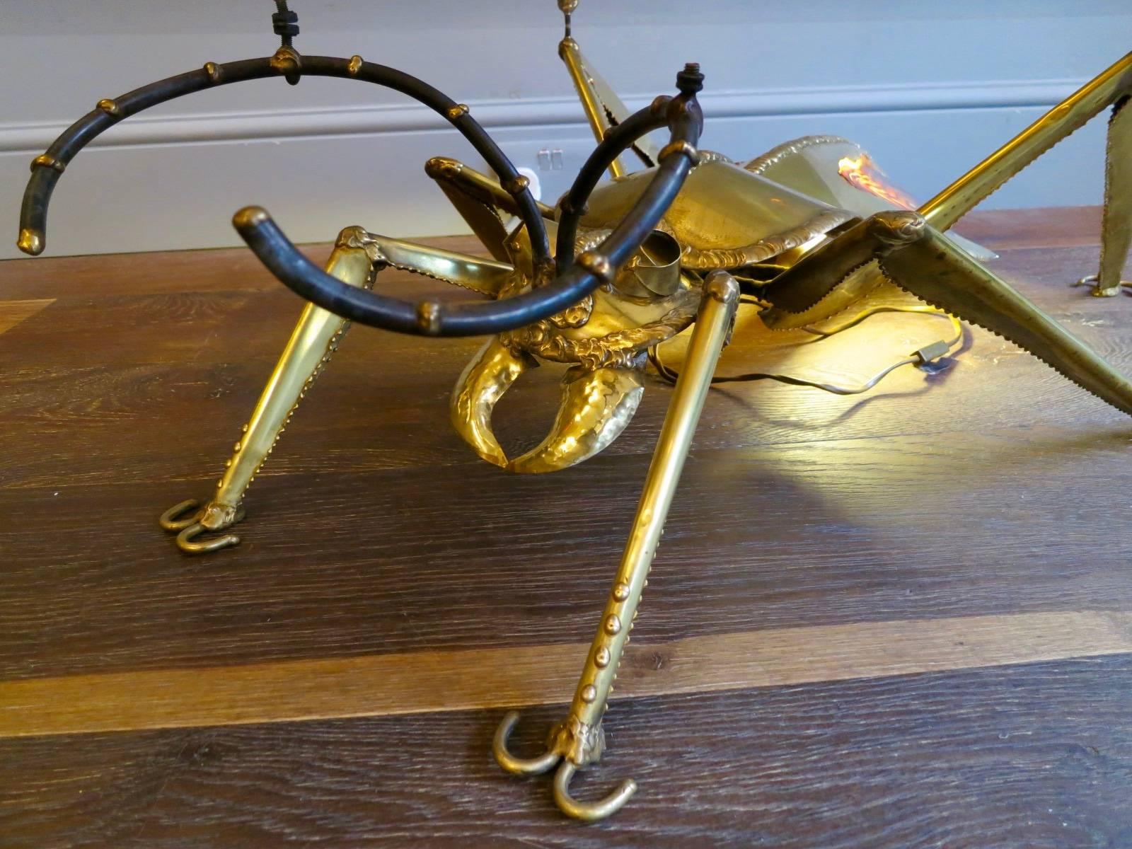 A brass and agate lit insect table for Atelier Duval-Brasseur.

 Henri Fernandez a senior lecturer in the departments of Architecture and interior Architecture for the Rhode Island school of design, first started designing art furniture which