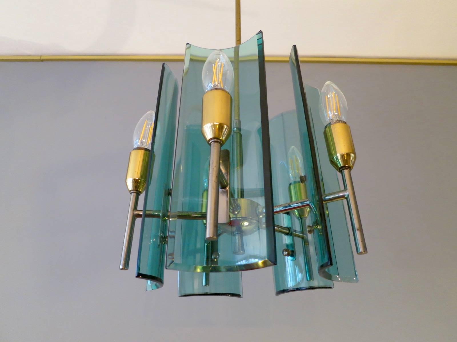 A very good quality five-arm pendant with thick green curved diffuser and nickel and brass frame and fittings. By G Paroldo Italy.