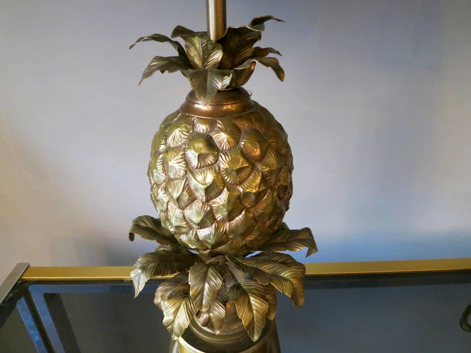 A very fine pair of patinated bronze and bronze pineapple lamps with original bronze shades. Signed Charles and in excellent condition, late 20th century.