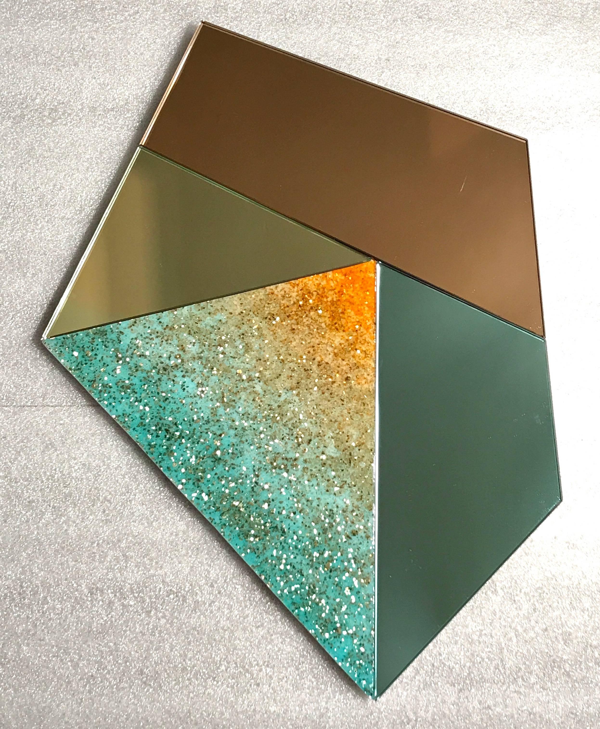 
Mirror wall art, each one unique with handmade kiln-formed glass sections. Each piece is made using ground powdered glass with copper and silver mica built up in fine layers, fired multiple times then laboriously cold worked to a polished finish.