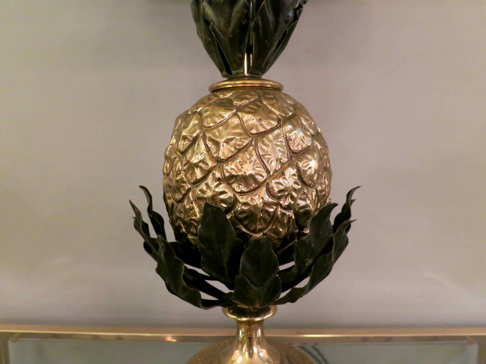 A tall pineapple table lamp in brass and bronze, by Maison Charles. Very good quality, with a cream silk shade.