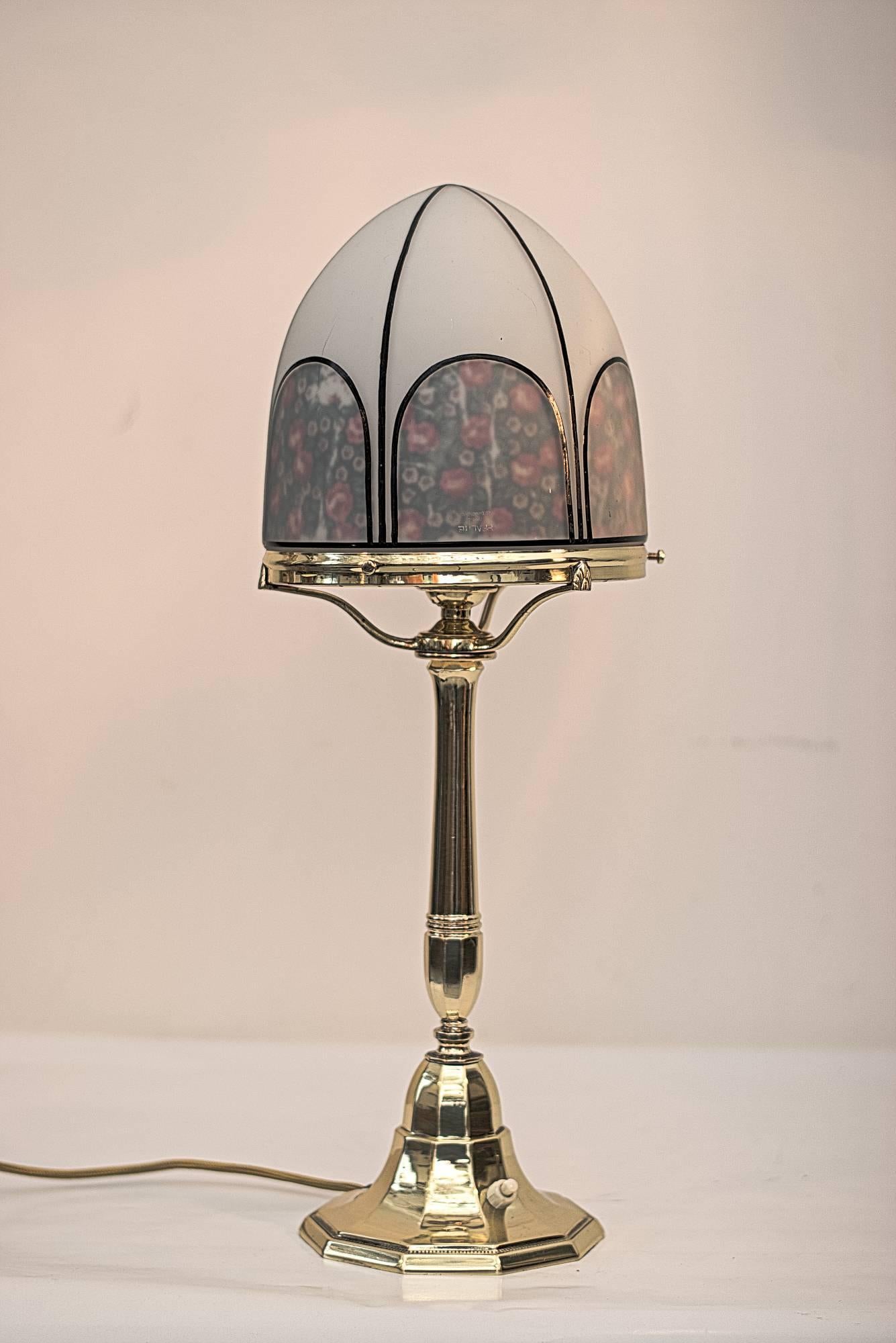 Jugendstil table lamp.
Polished and stove enameled.