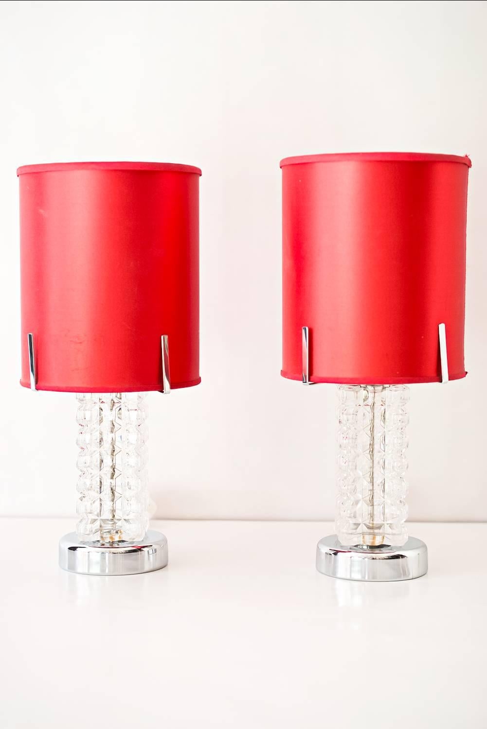Two austrolux table lamps with original red fabric shade
Original condition.