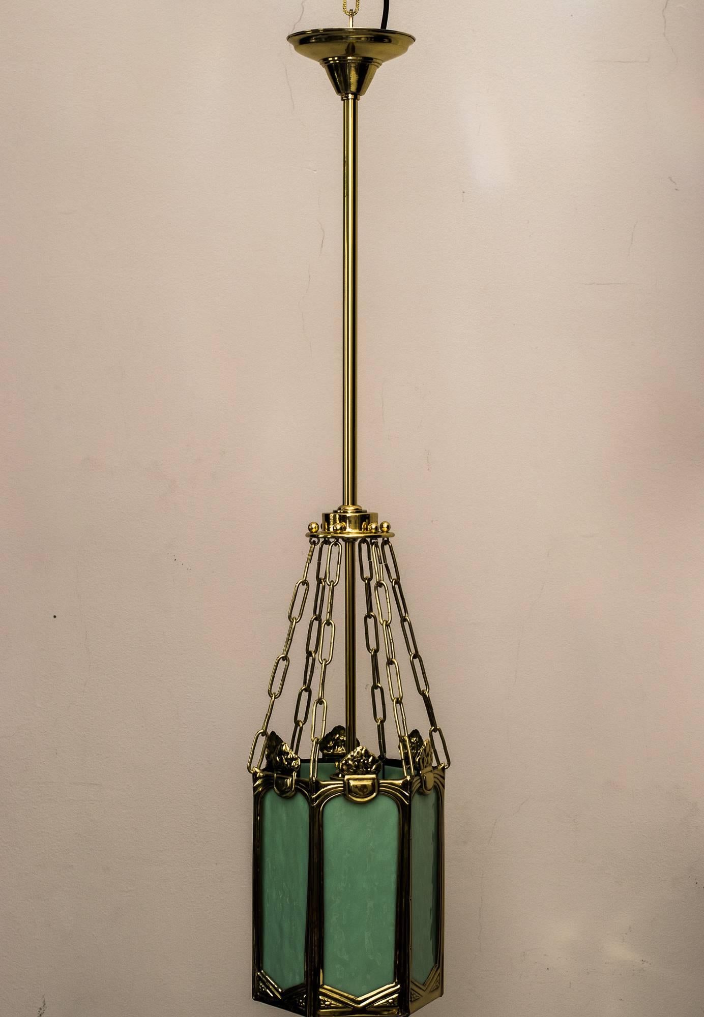 Beautiful Art Nouveau pendant with original opaline glasses, circa 1909s
polished and stove enameled
one bulb.