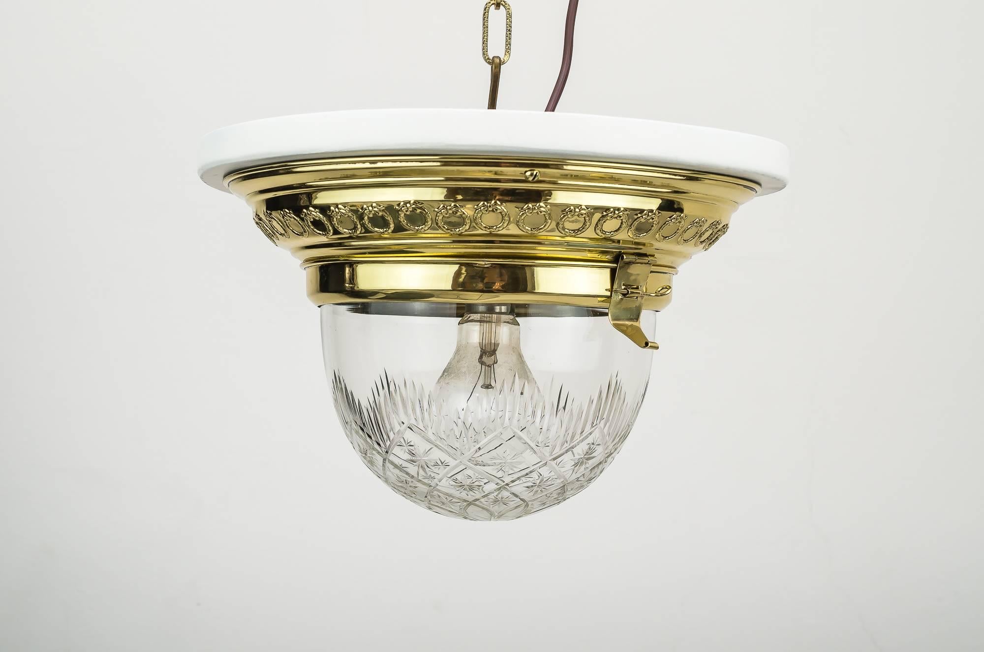 Two jugendstil ceiling lamps 1906 with original glass and painted wood plate
Polished and stove enamelled.