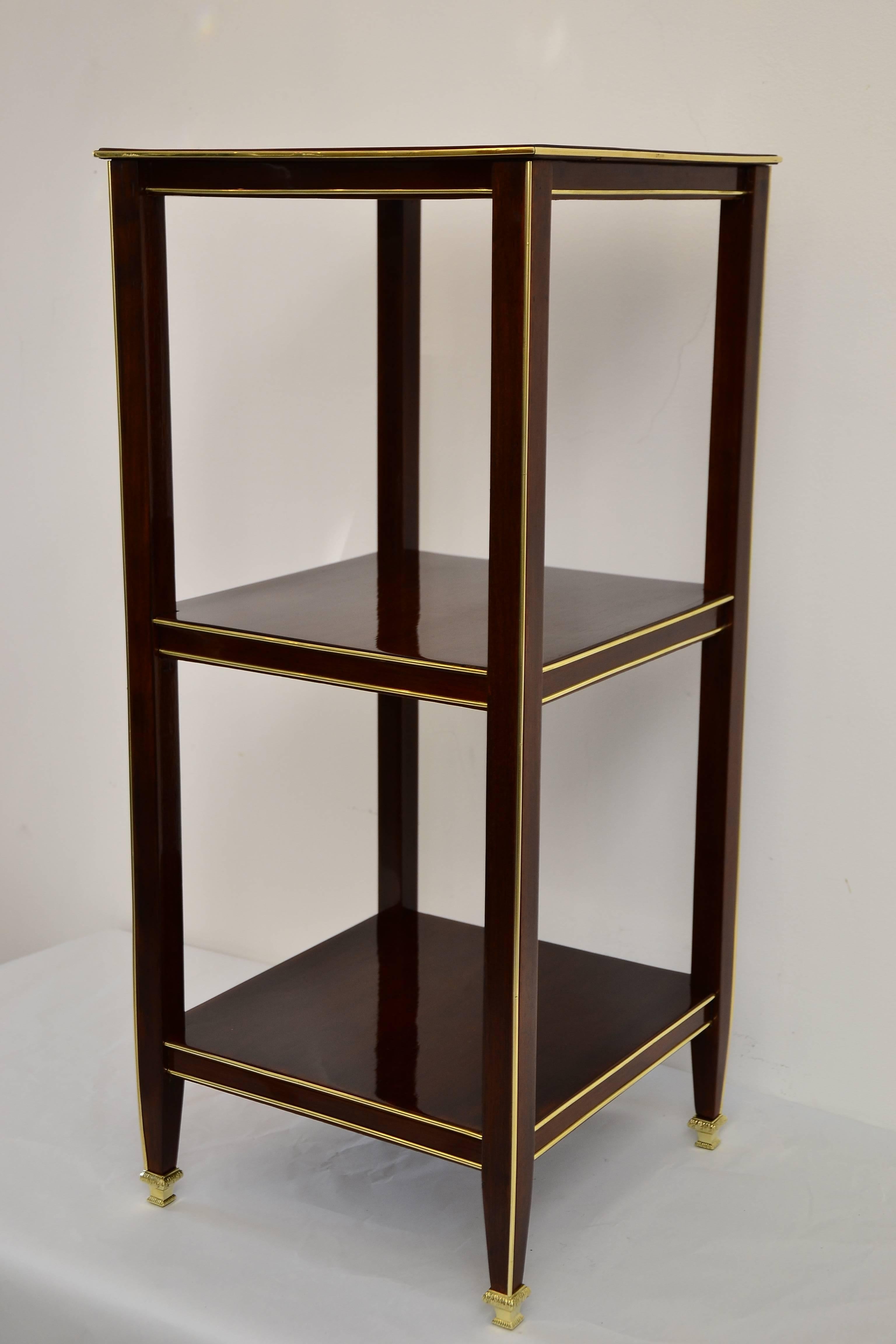 Art Deco table polished nut wood and brass inlaid, circa 1920
polished brass legs.