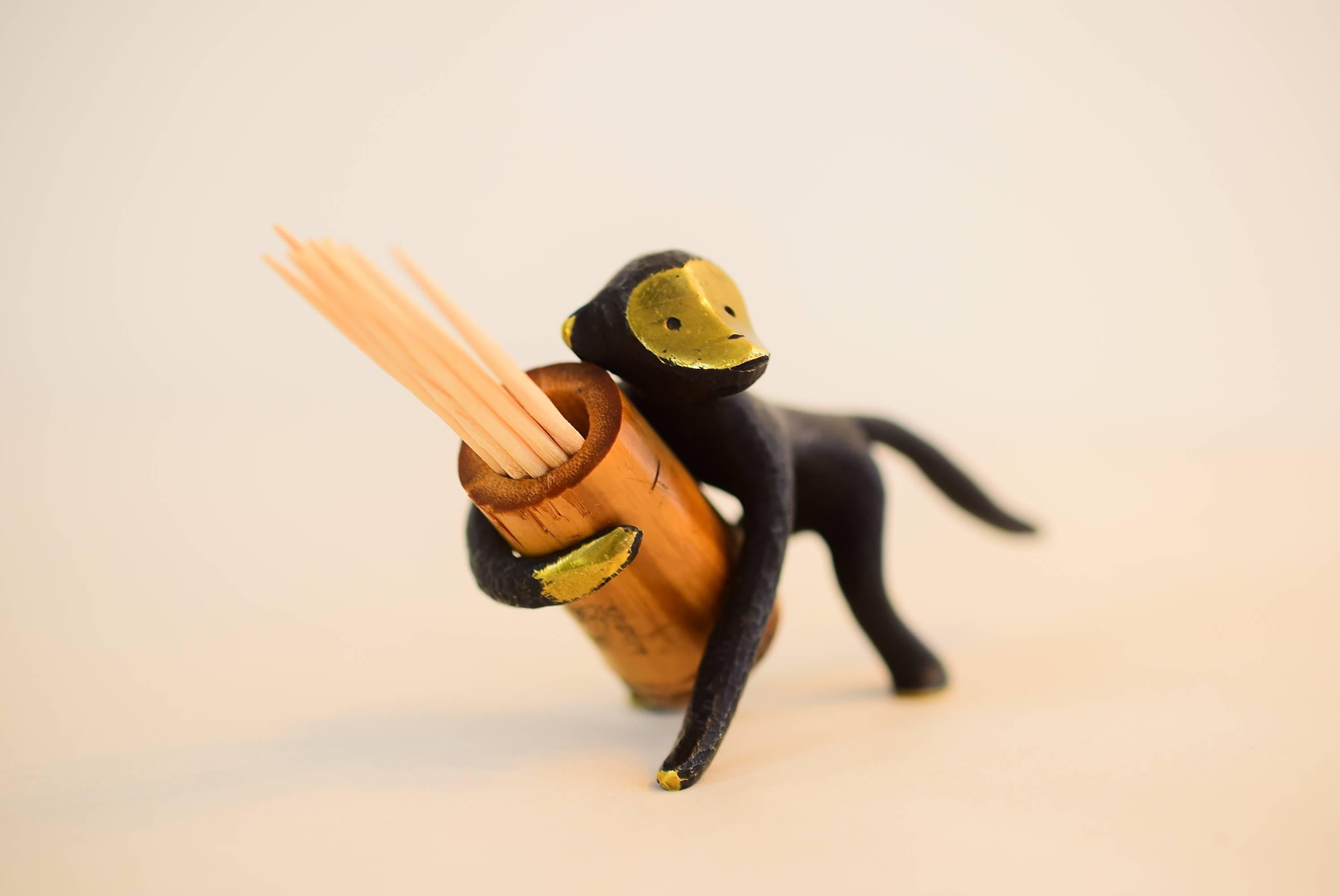 Austrian toothpick holder, displaying a monkey. Design by Walter Bosse.