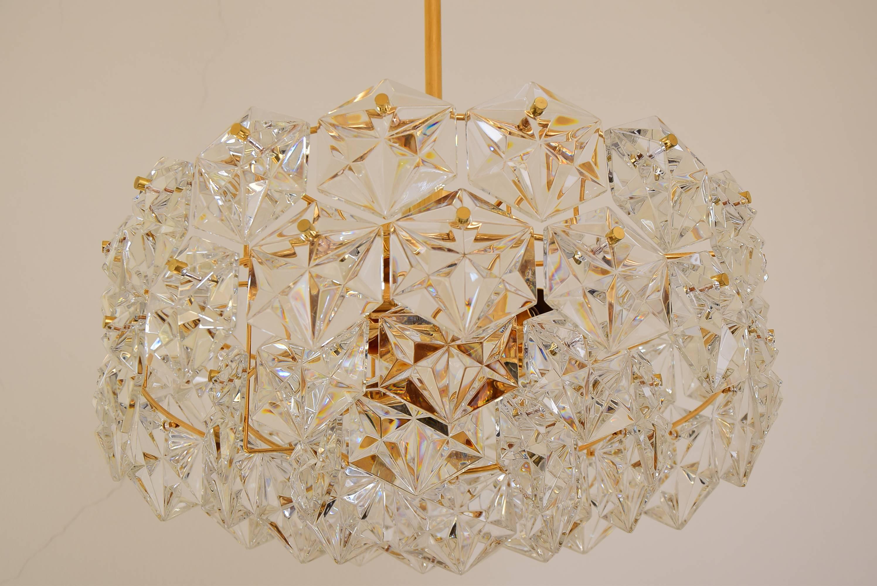 Gilded Kinkeldey chandelier with crystal glass.
Original condition.
 