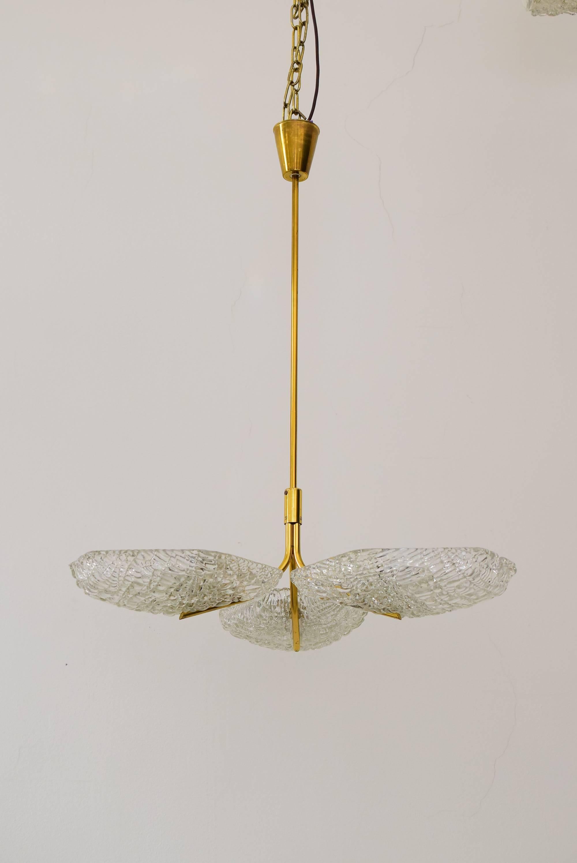 Beautiful chandelier by kalmar glass and brass.

Original condition.