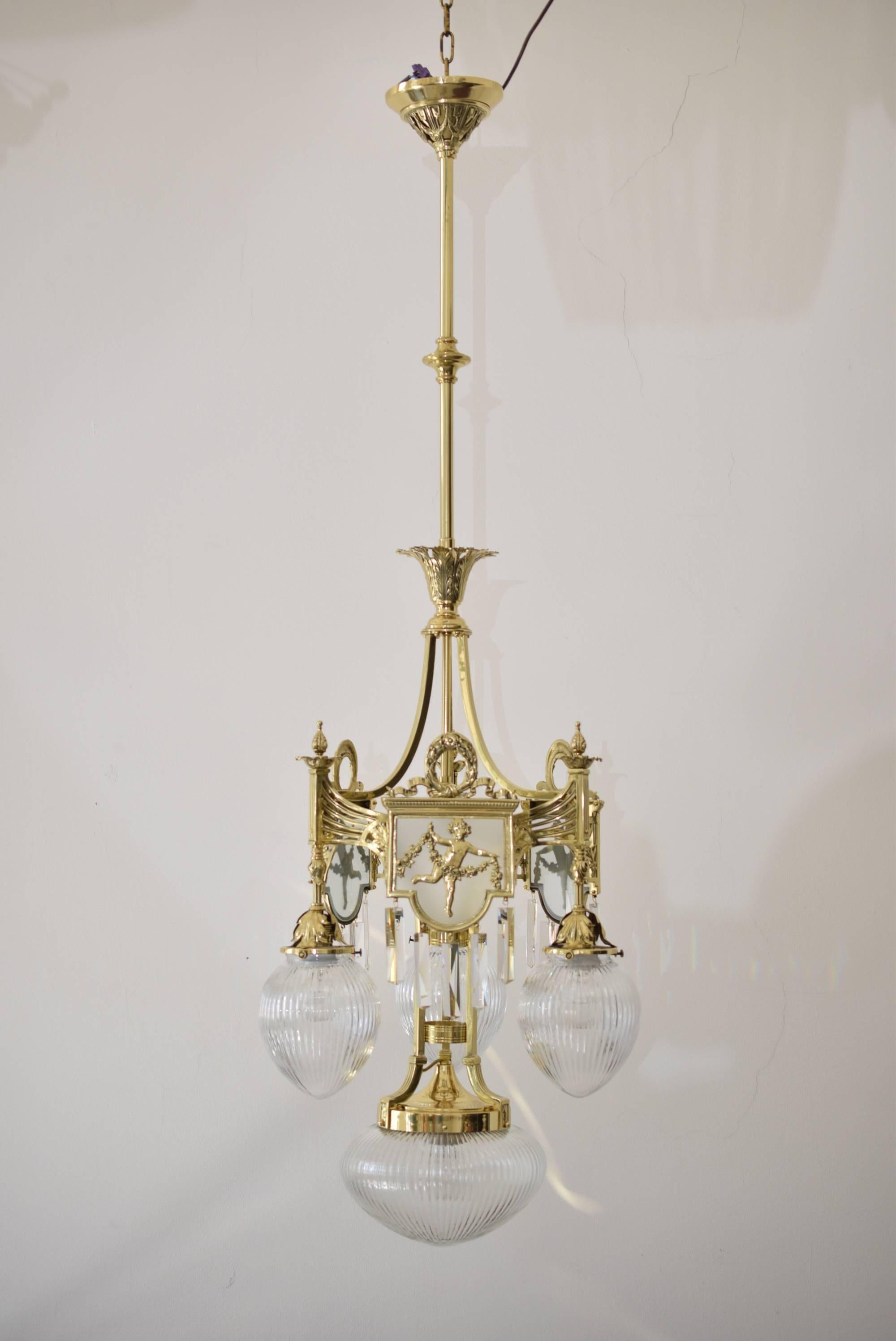 Amazing historistic chandelier, 
polished and stove enamelled.