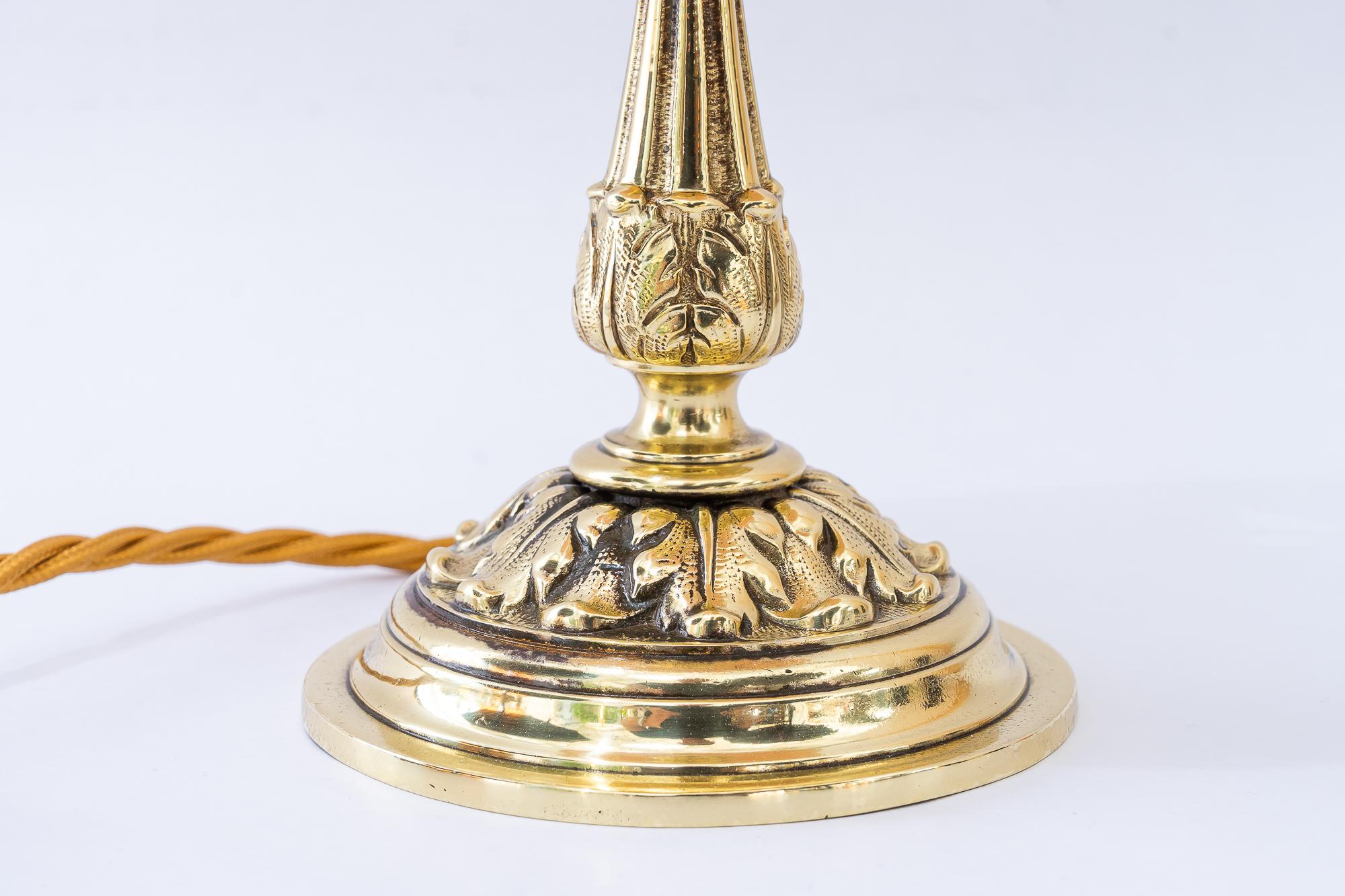 Historistic brass table lamp with fabric shade vienna around 1890s
Brass polished and stove enameled
The fabric shade is replaced ( new )