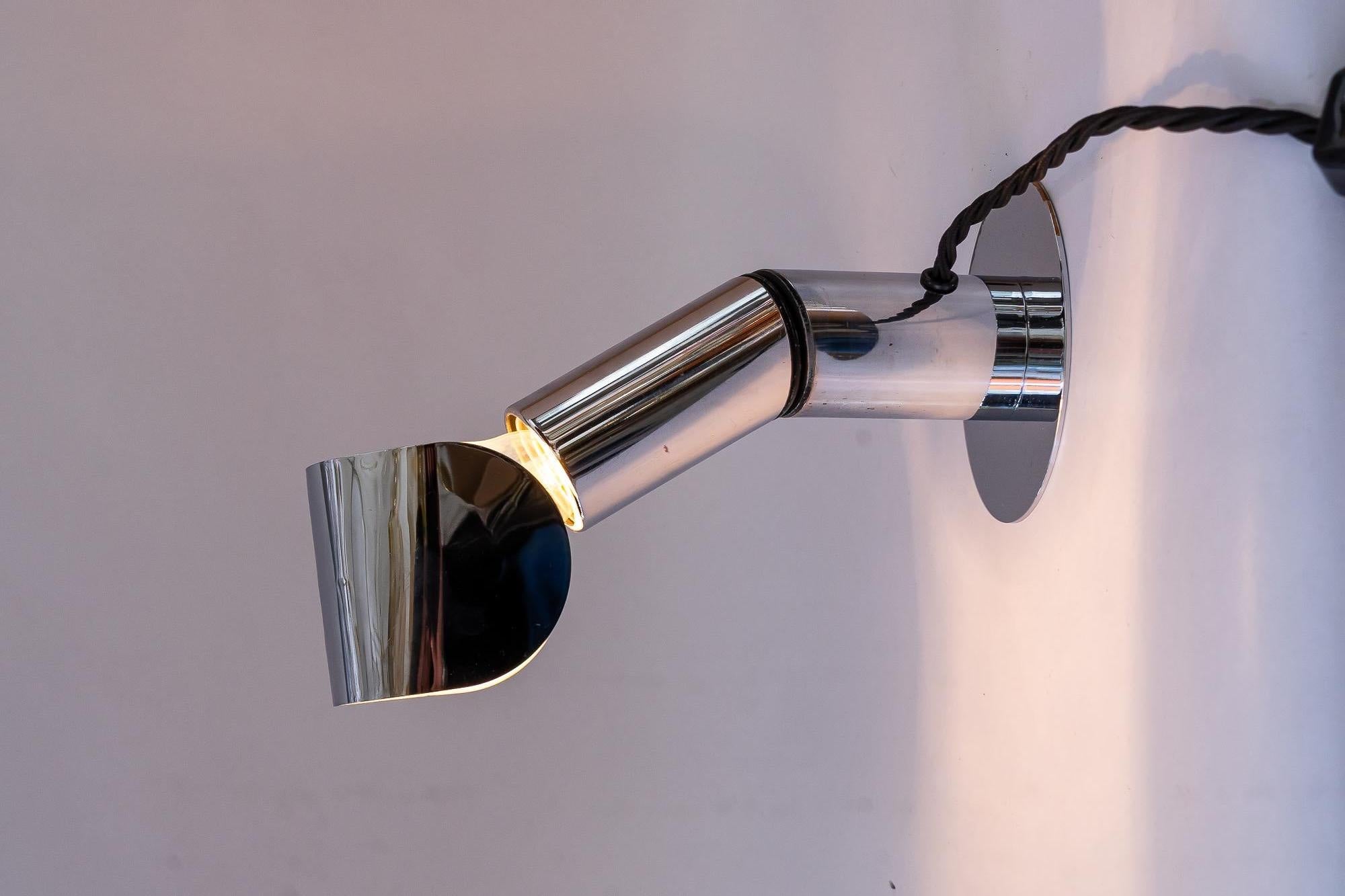 Adjustable space age nickel wall or table lamp around 1970s
Original condition

