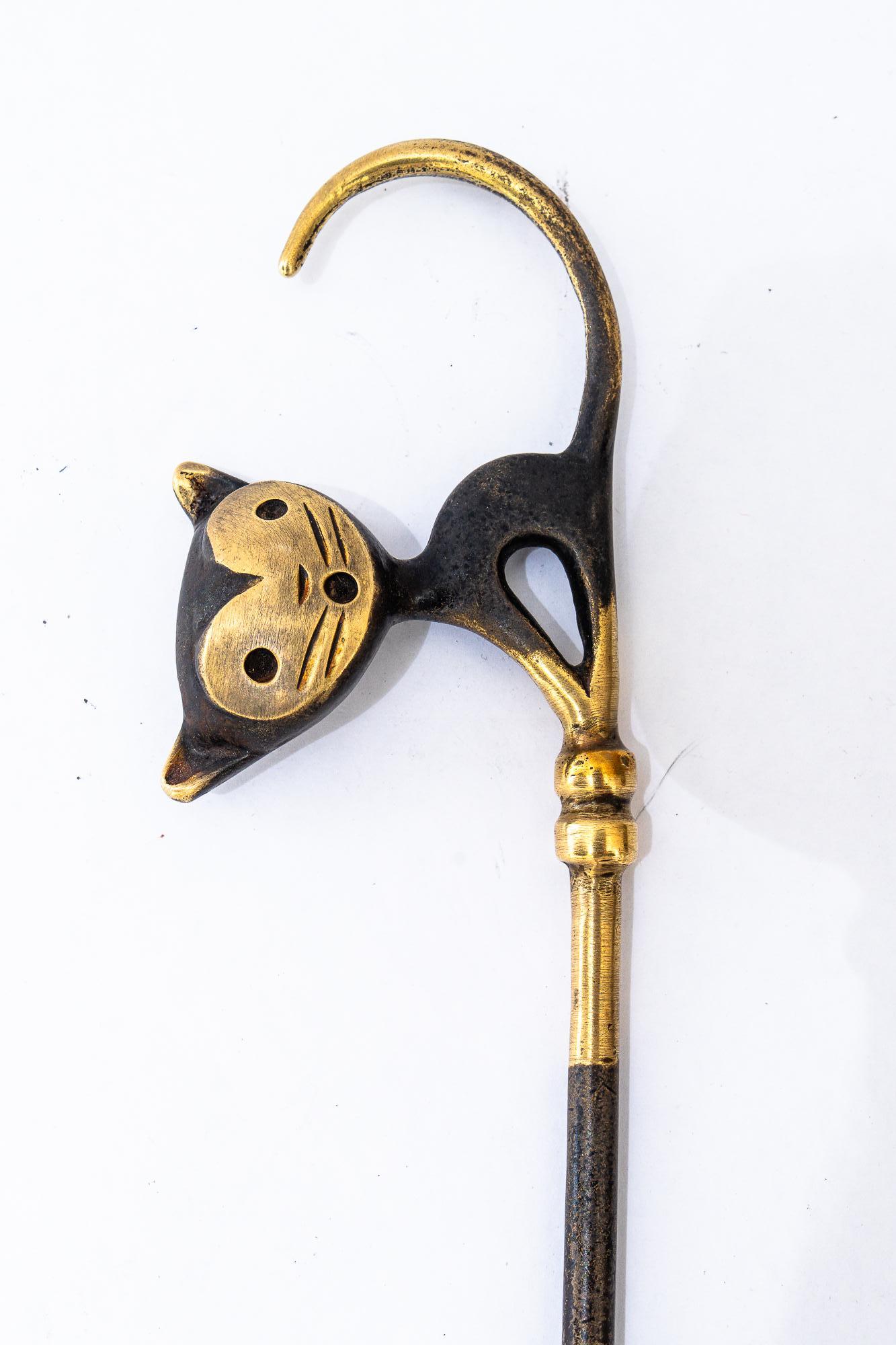 Blackened Shoehorn Shows a Cat by Walter Bosse Around, 1950s For Sale