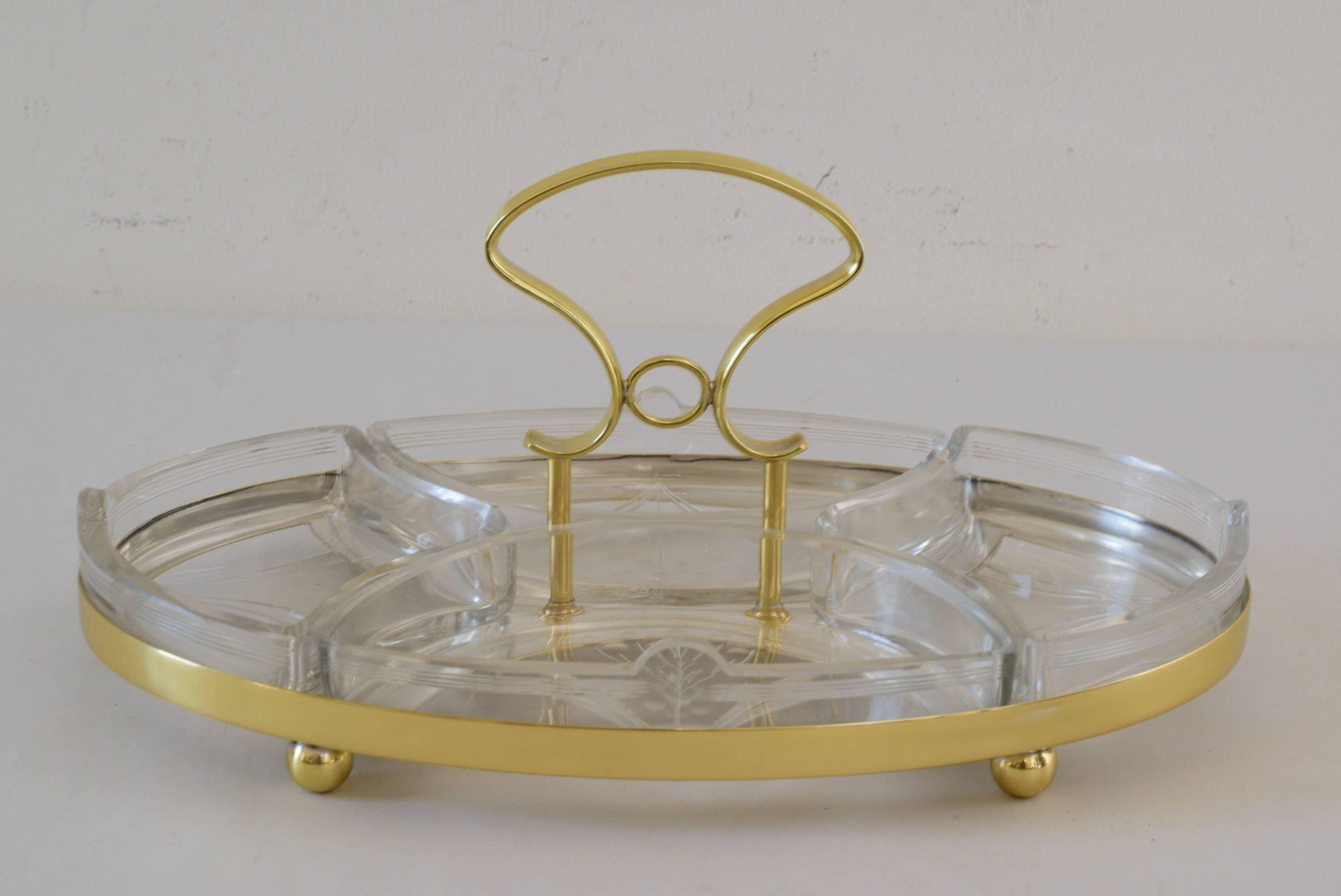 Jugendstil WMF centerpiece with original cut glass.
Four separate insets.
Polished and stove enameled.