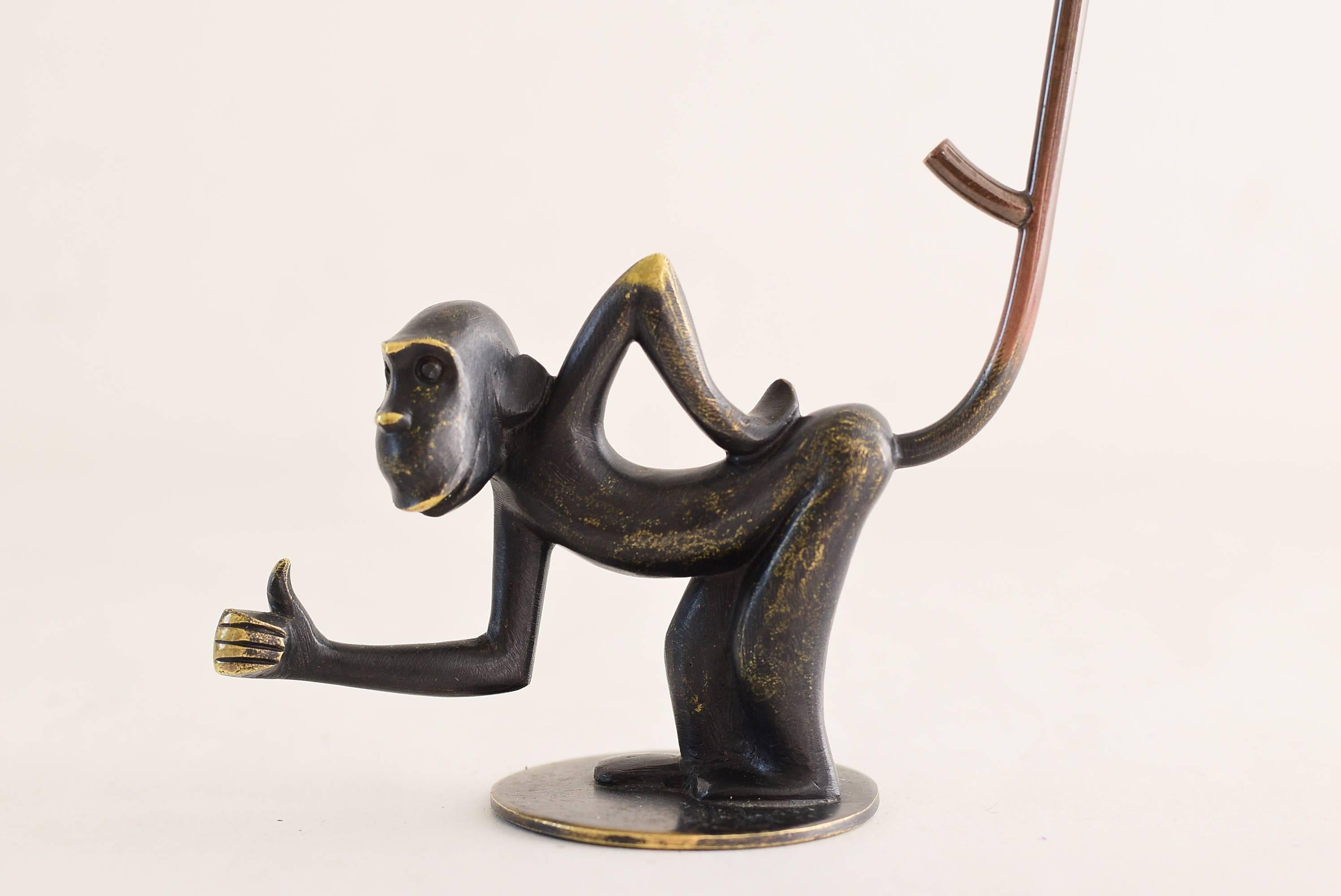 Brass monkey figurine pretzel holder, ring holder by Richard Rohac.
Original condition.