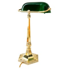 Solid Art Deco Banker table lamp with green glass around 1920s