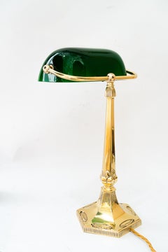 Solid Art Deco Banker table lamp with green glass around 1920s