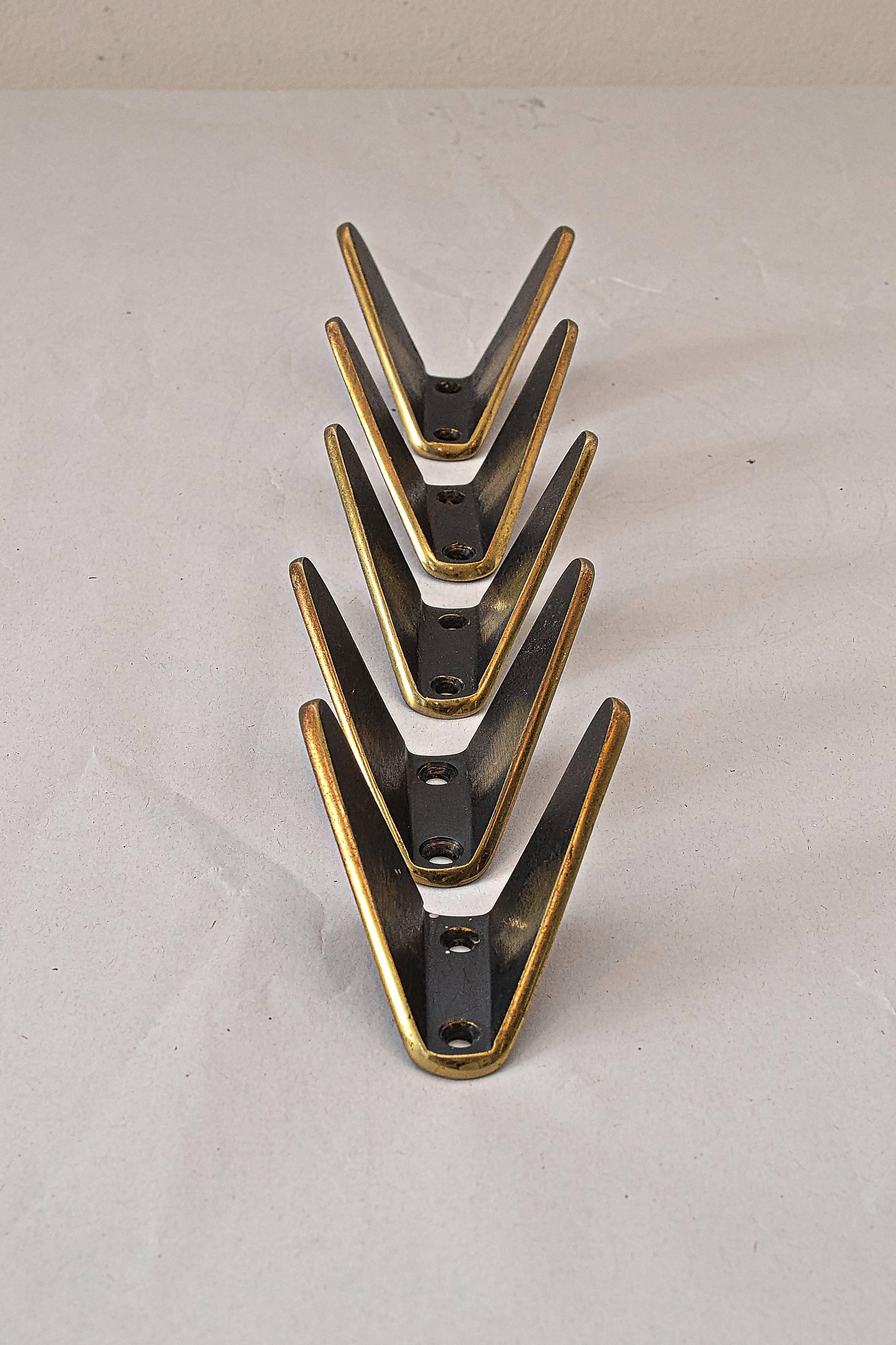 Five modernist brass wall hooks by Hertha Baller, Vienna, 1950.
Original condition.
Two have traces of use.