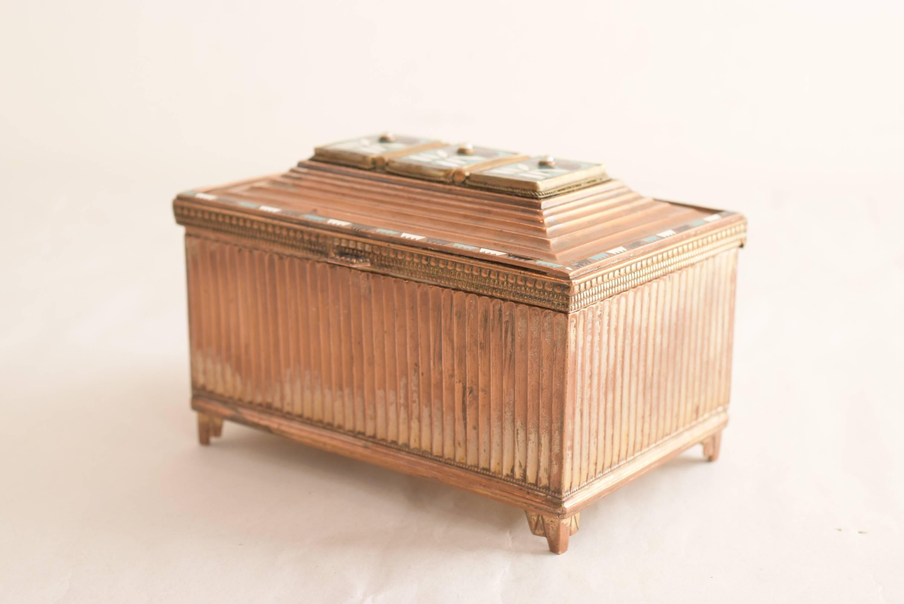 Box is copper partly enamel. 
Three small pearls.
Original condition.