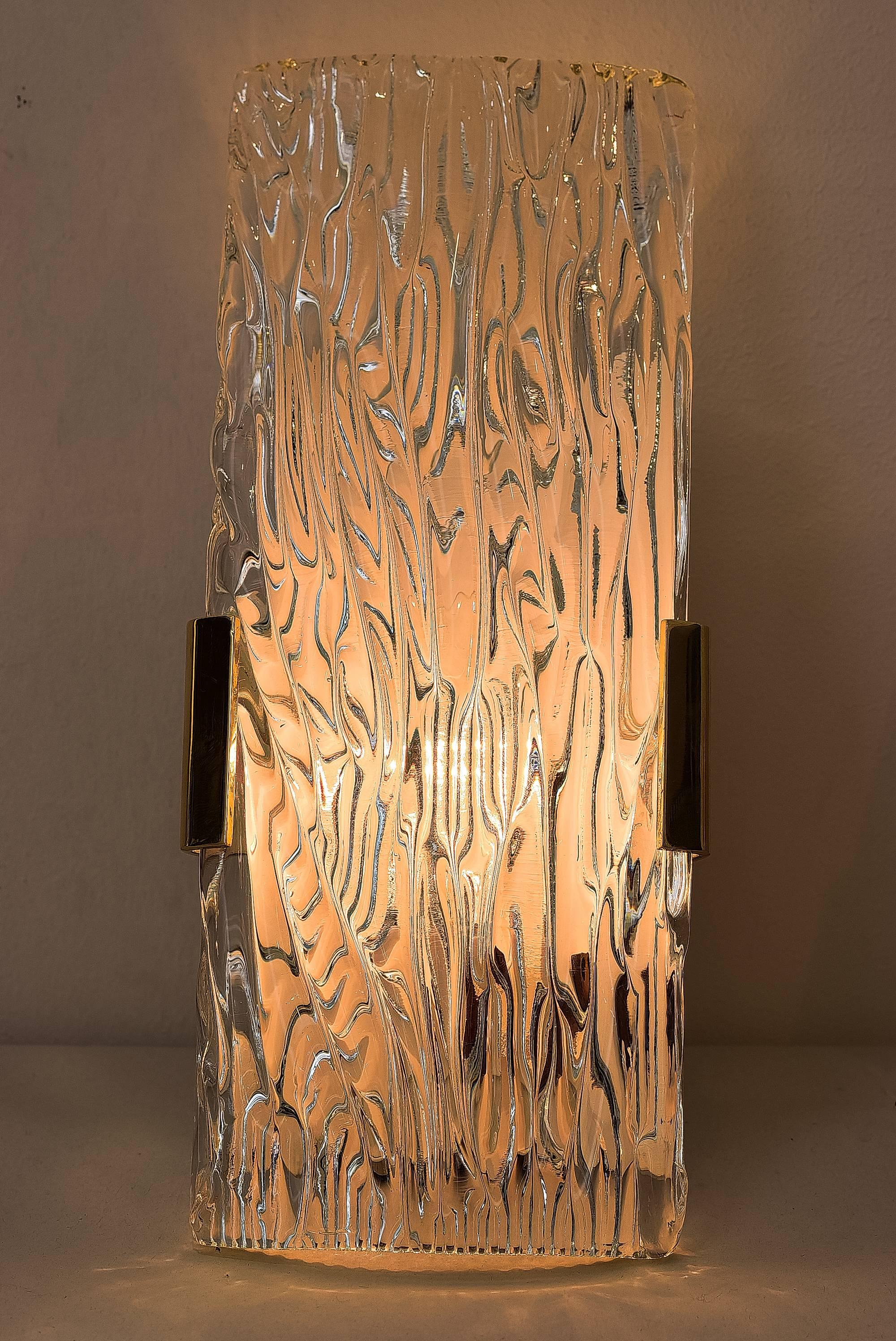 Kalmar ice glass wall sconce, Austria, 1960s.
Brass parts polished and stove enamelled.