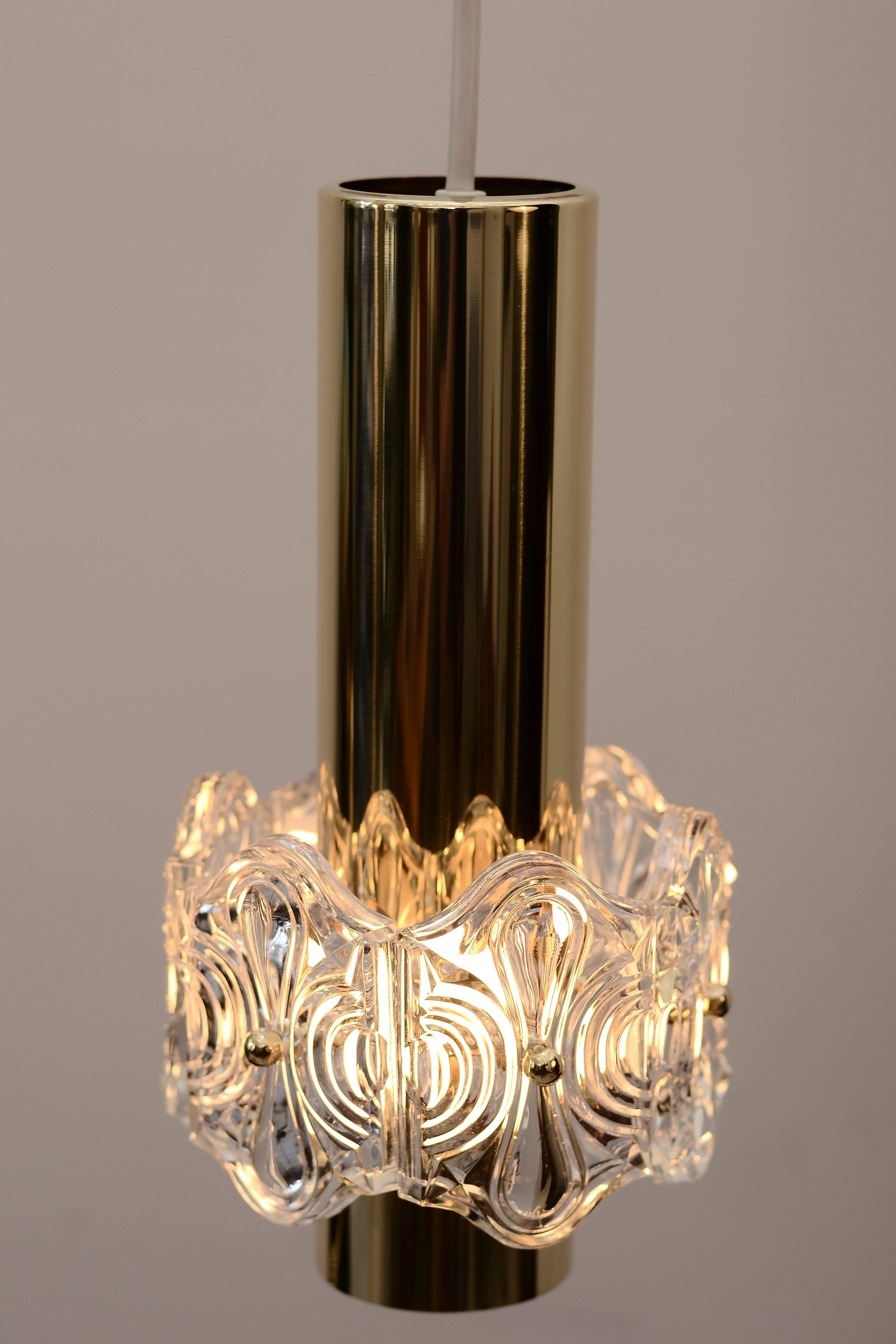 Two Kinkeldey crystal fixture with brass base
2 are available, priced and sold per piece.


polished.