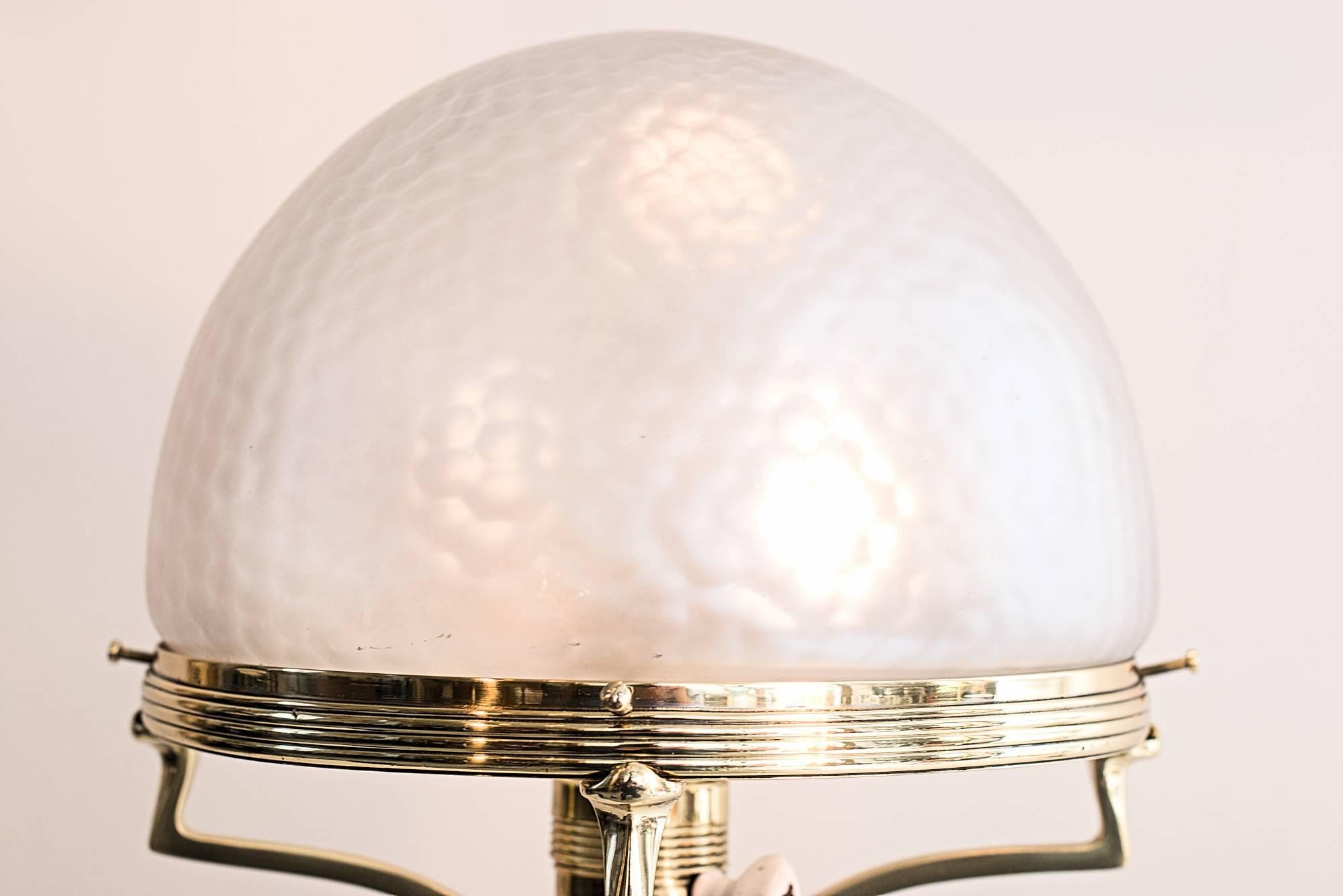 Beautiful jugendstil table lamp with original glass
polished and stove enamelled.