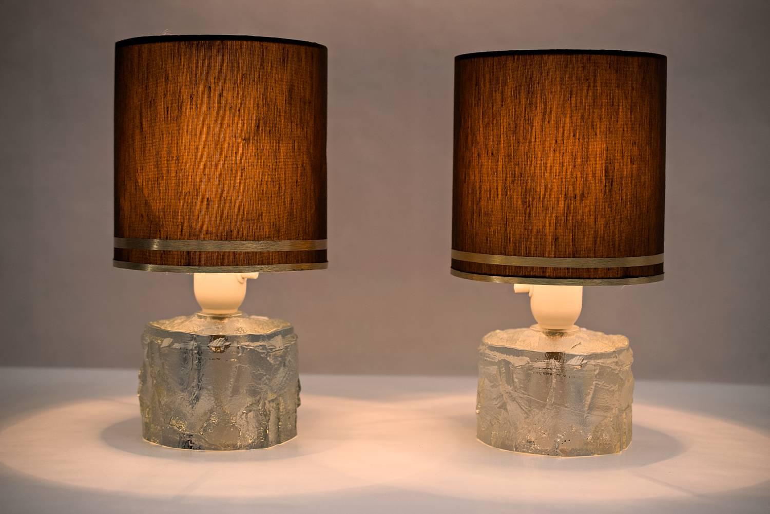 Two Göte Augustsson table lamps
the lamps are in a good condition,
the fabric is not in a perfect condition but it is original.