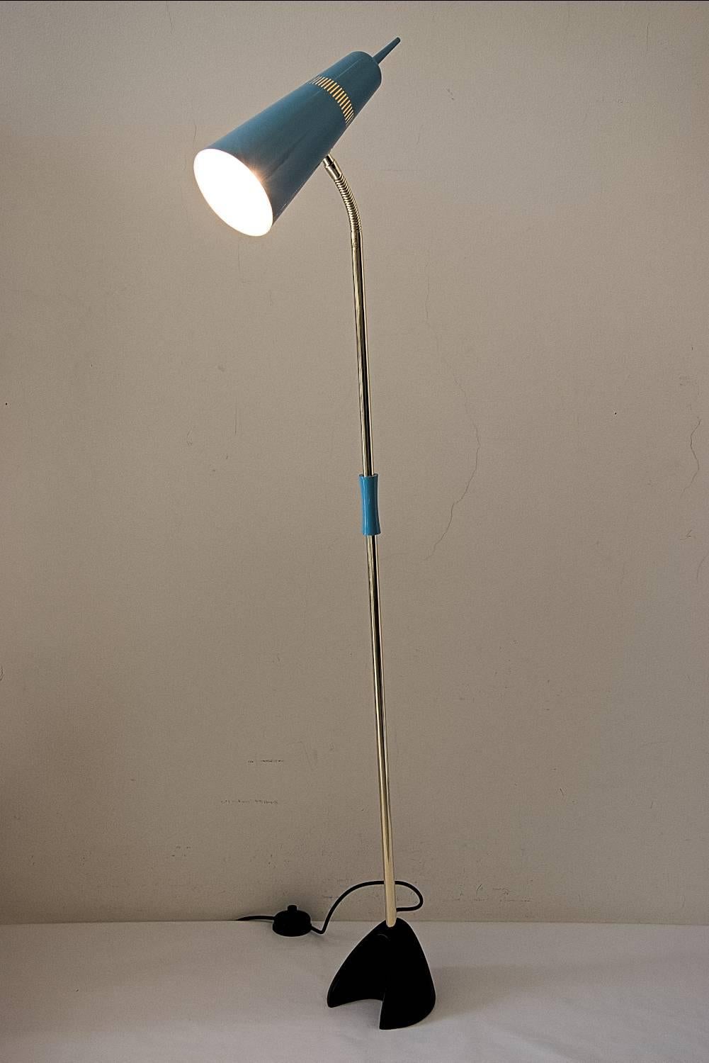Floor lamp, Vienna, 1950s
Original antique only polished brass
Shade is aluminium laquered 
Wood handle painted
Iron base black painted.