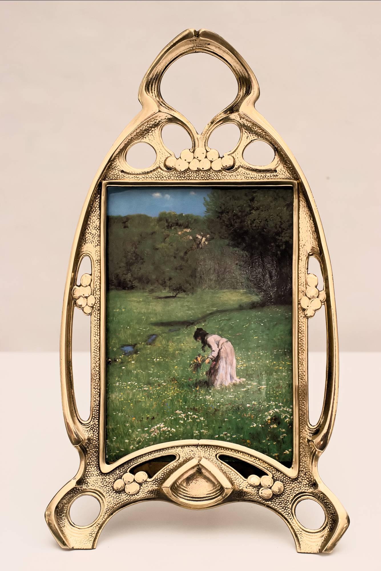 Solid Art Nouveau picture frame
polished and stove enamelled.
