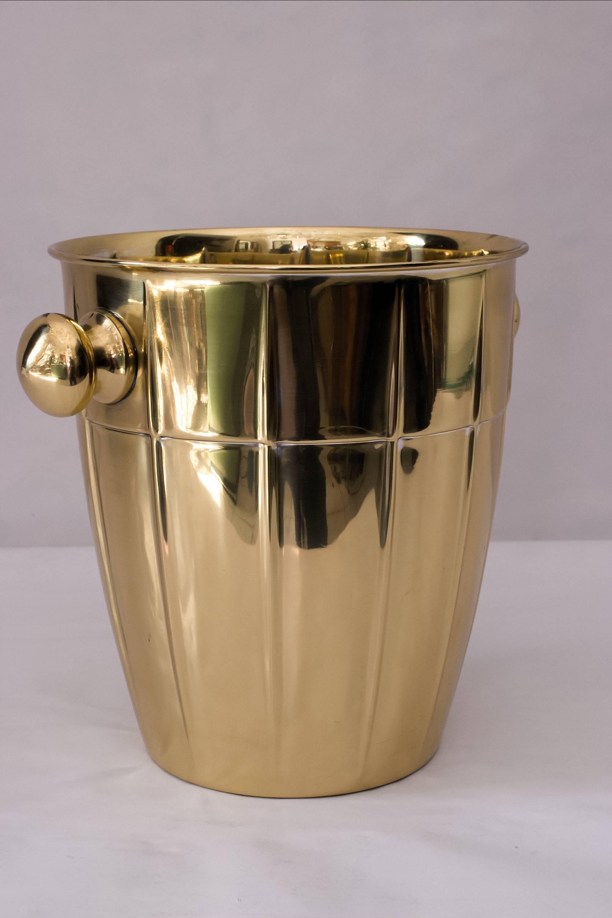 Art Nouveau brass champagne cooler
polished and stove enamelled.