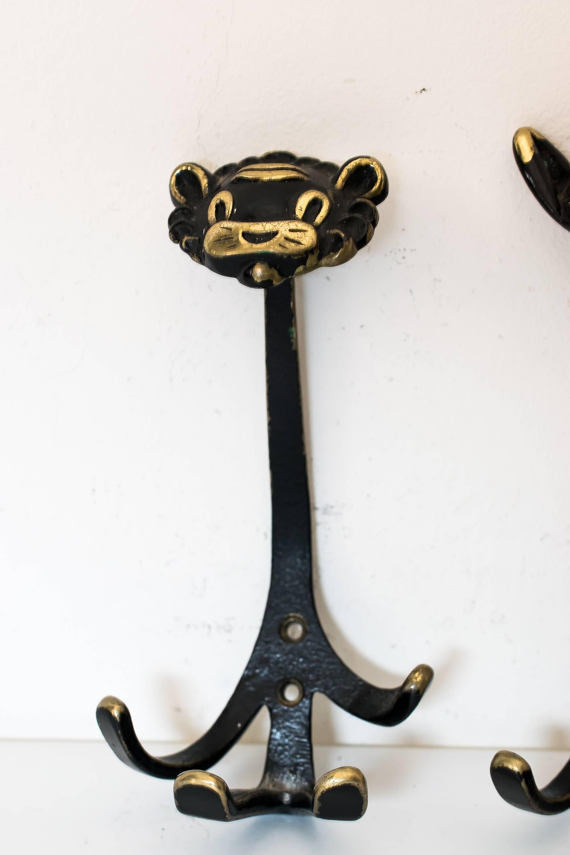 Two Walter Bosse wall hooks shows a cat and a lion, circa 1950s
Original condition
Measures: Lion: H 17cm, W 9cm, D 8cm
Cat: H 18cm, W 9cm, D 7cm.
2 are available, priced and sold per piece.

