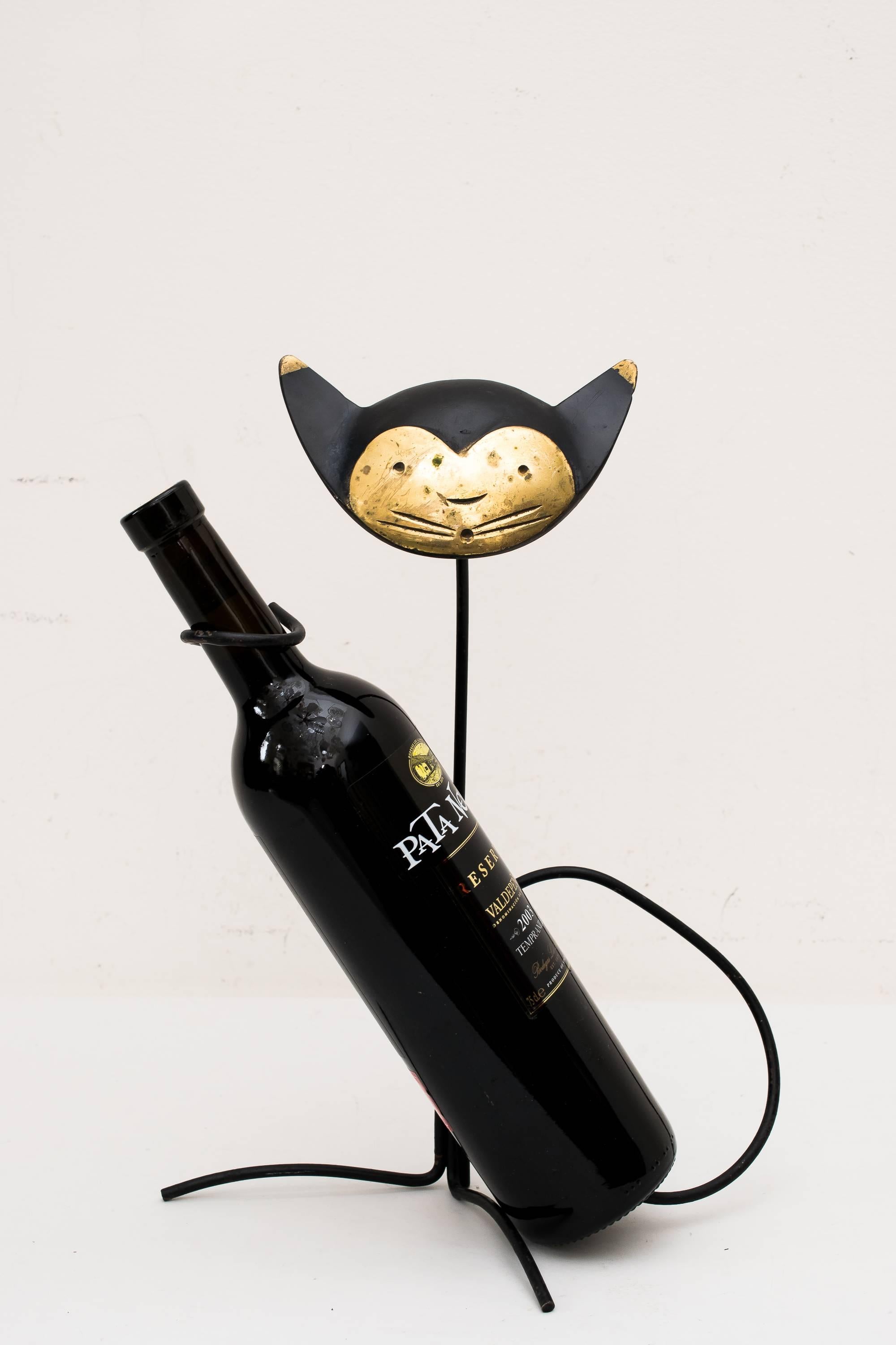 Big brass cat bottle holder by Walter Bosse, circa 1950s
(The Bottle is only decoration, not for sale)
Original condition.