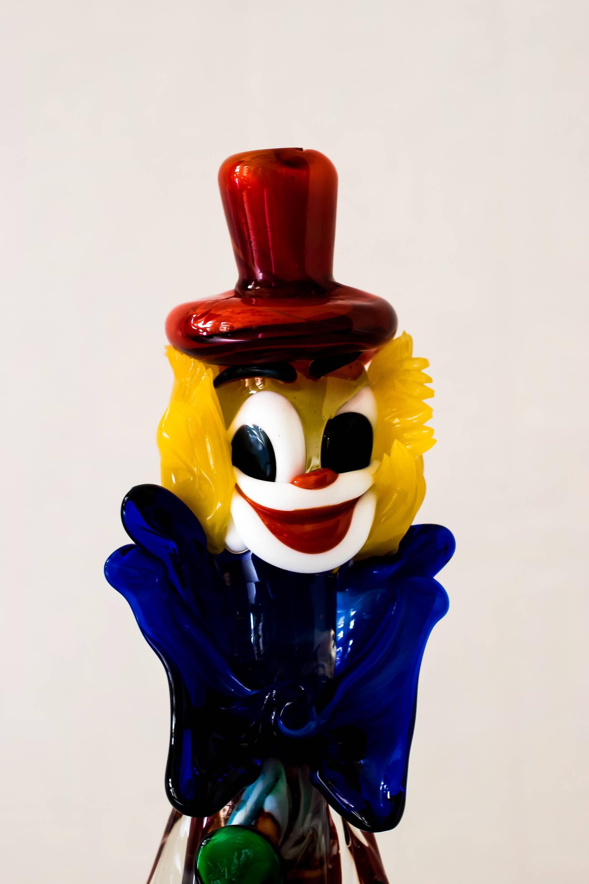 The glass clown was designed and manufactured in the Mid-Century Modern era in Murano, Italy.
Original condition.