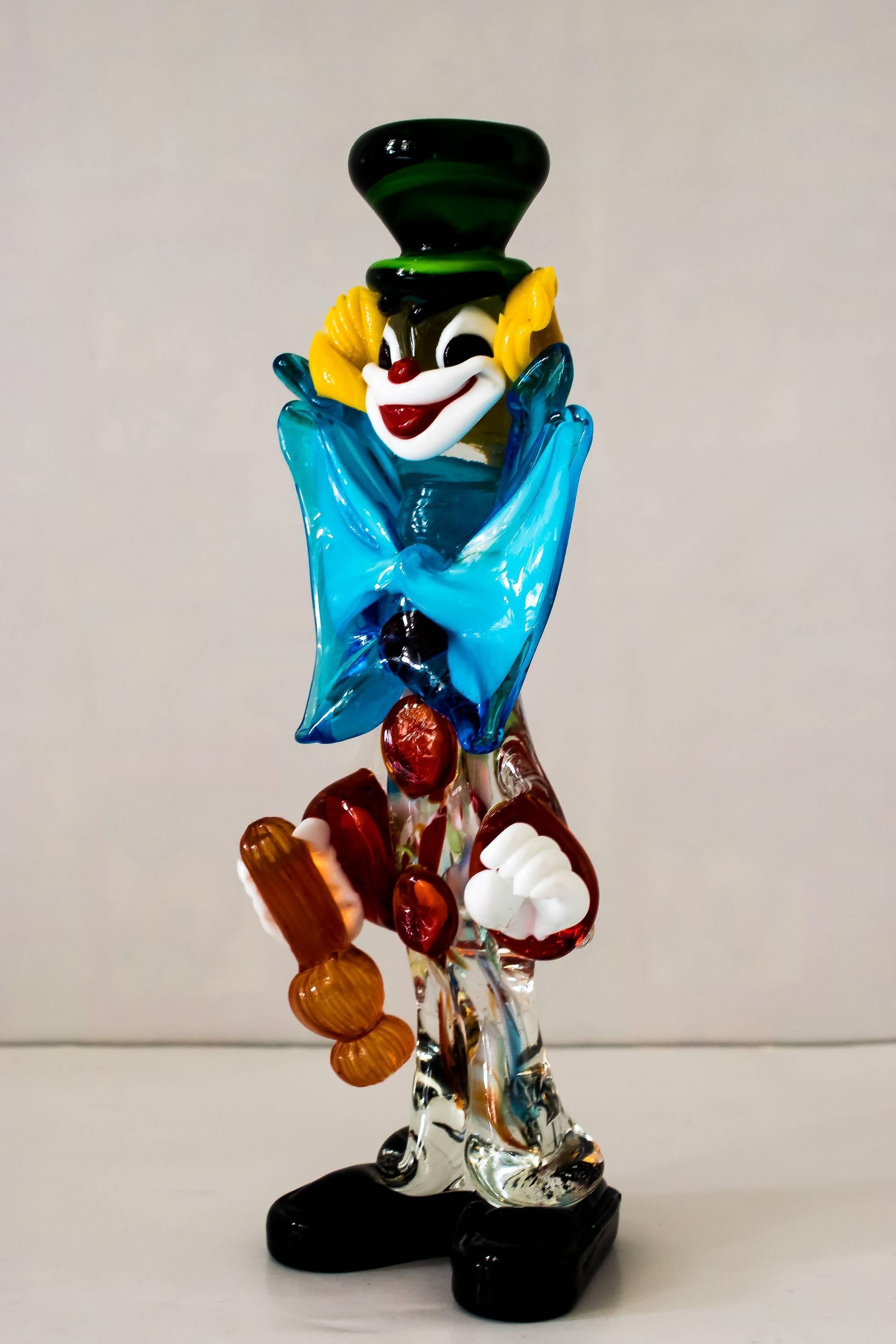 The glass clown was designed and manufactured in the Mid-Century Modern era in Murano, Italy.
We have another only bigger.
  
